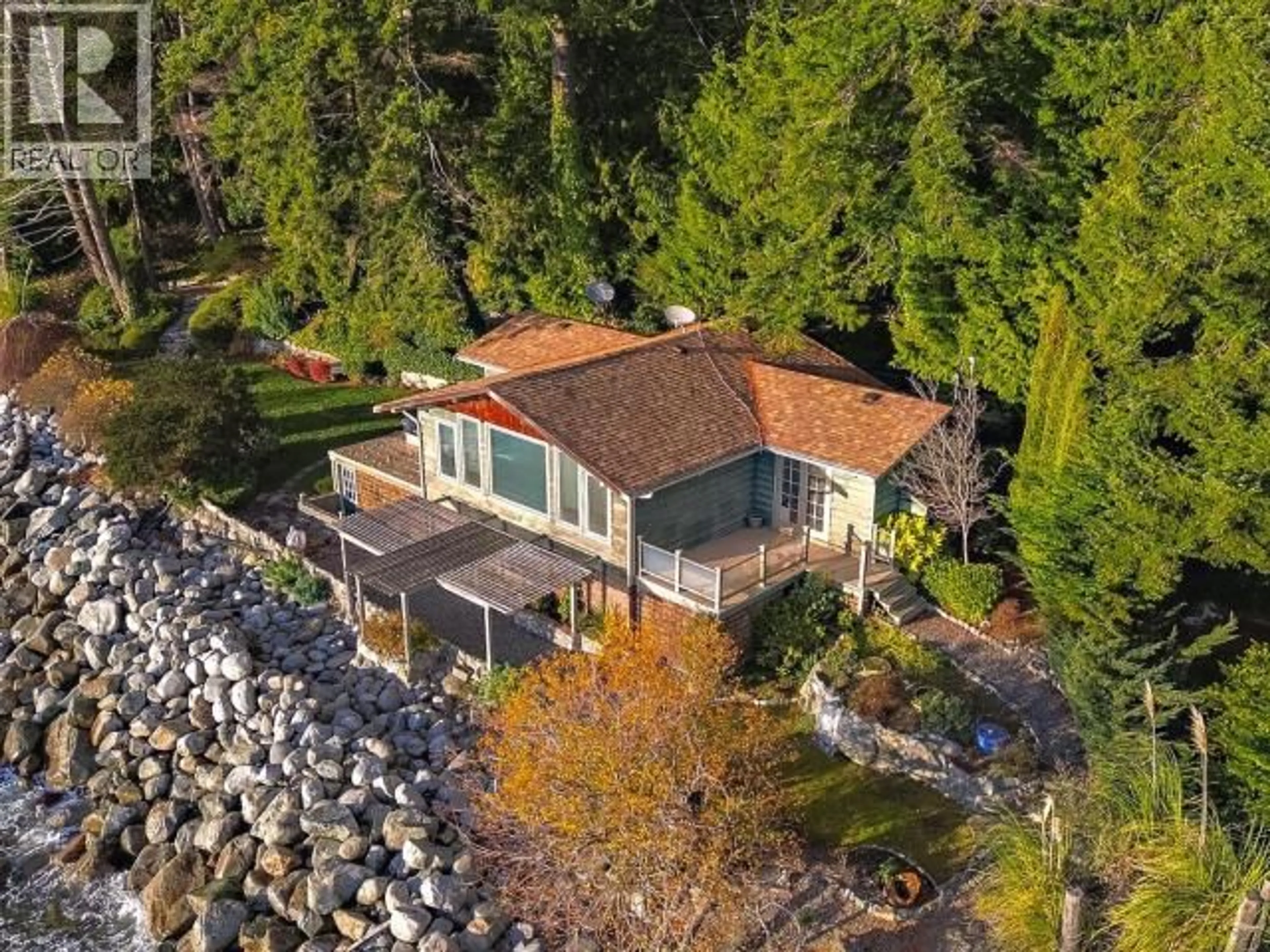 A pic from outside/outdoor area/front of a property/back of a property/a pic from drone, water/lake/river/ocean view for 3377 ATREVIDA ROAD, Powell River British Columbia V8A0E1