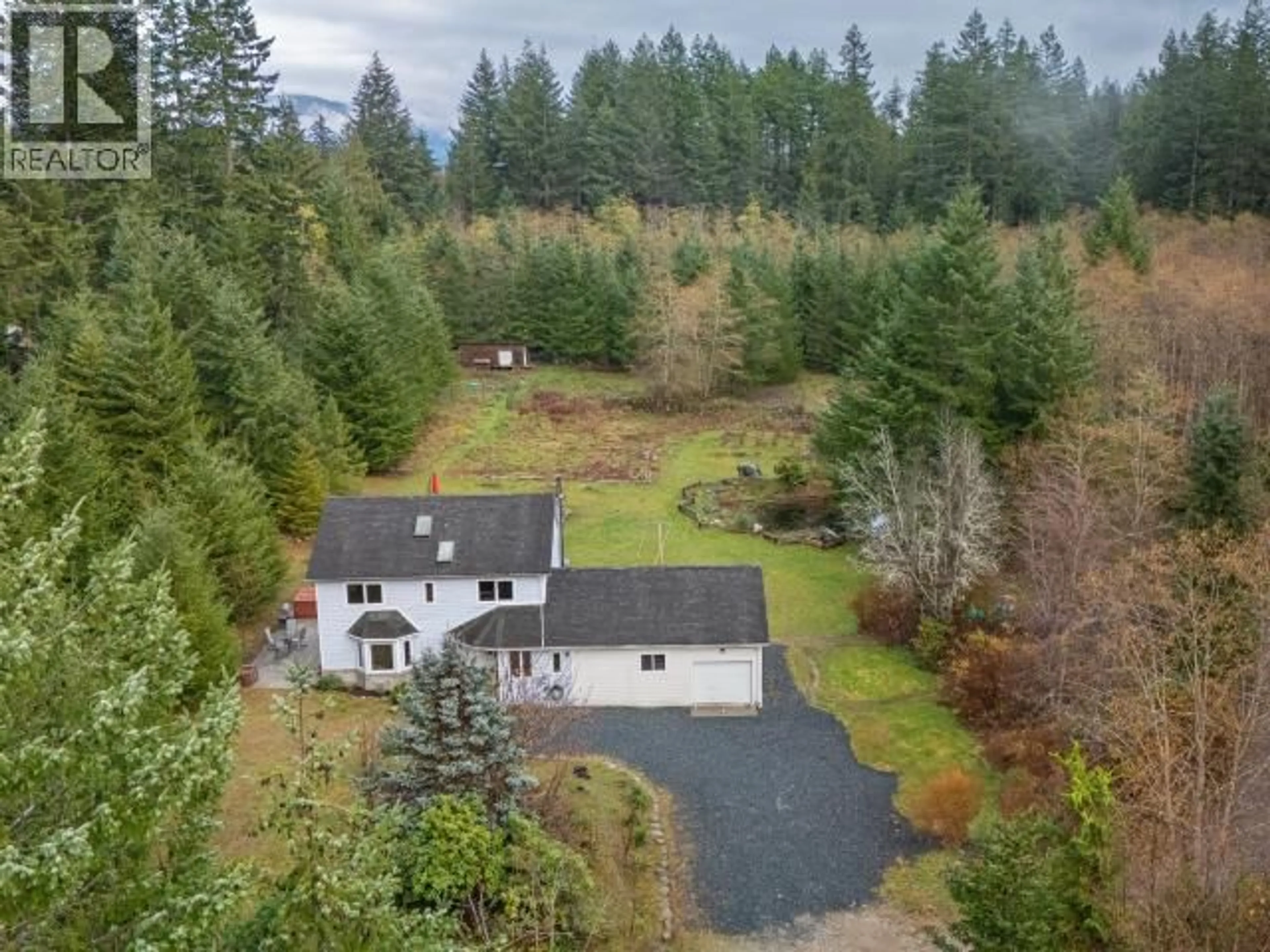 A pic from outside/outdoor area/front of a property/back of a property/a pic from drone, forest/trees view for 2560 MAYWOOD ROAD, Powell River British Columbia V8A0P4