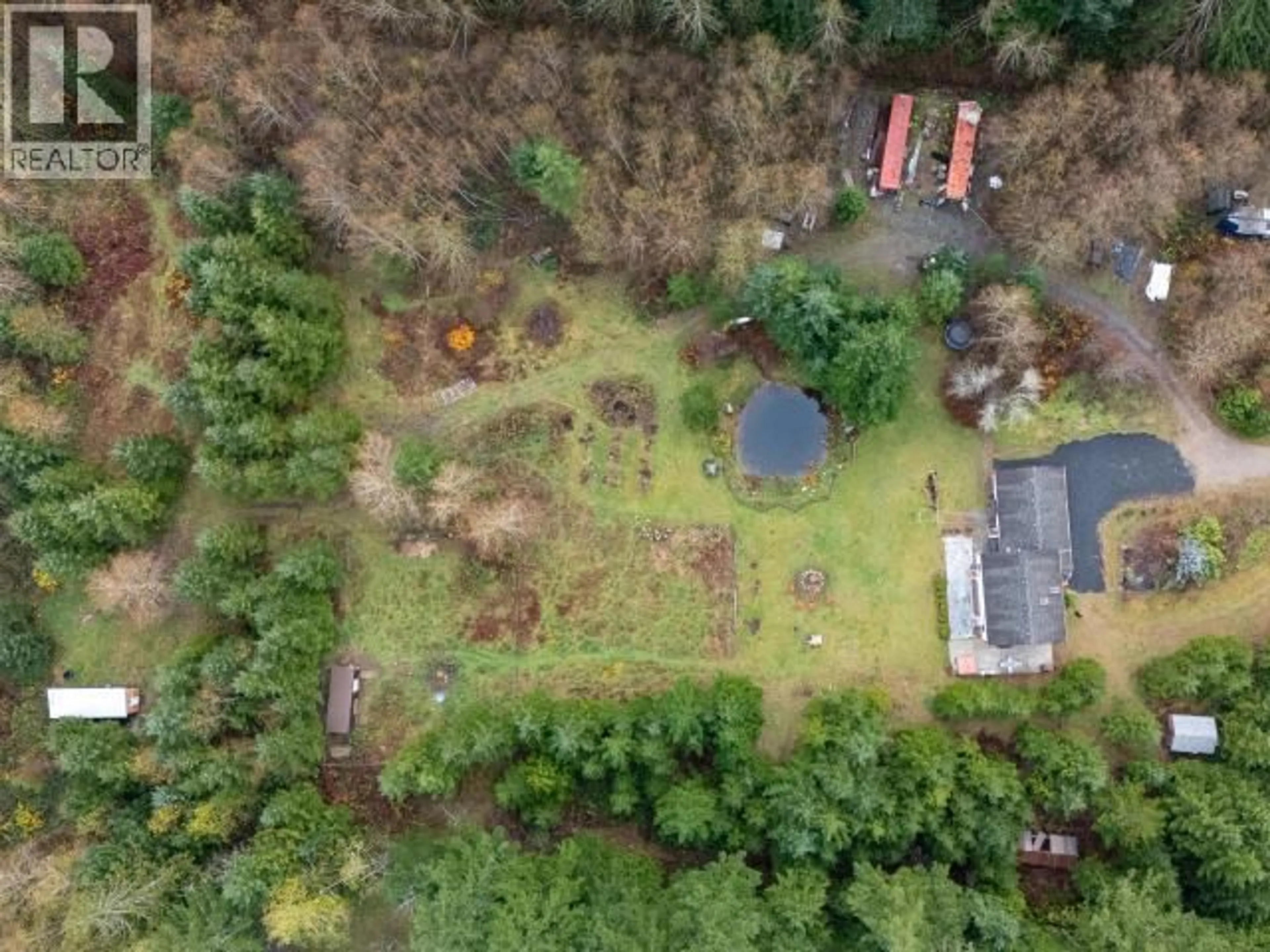 A pic from outside/outdoor area/front of a property/back of a property/a pic from drone, forest/trees view for 2560 MAYWOOD ROAD, Powell River British Columbia V8A0P4