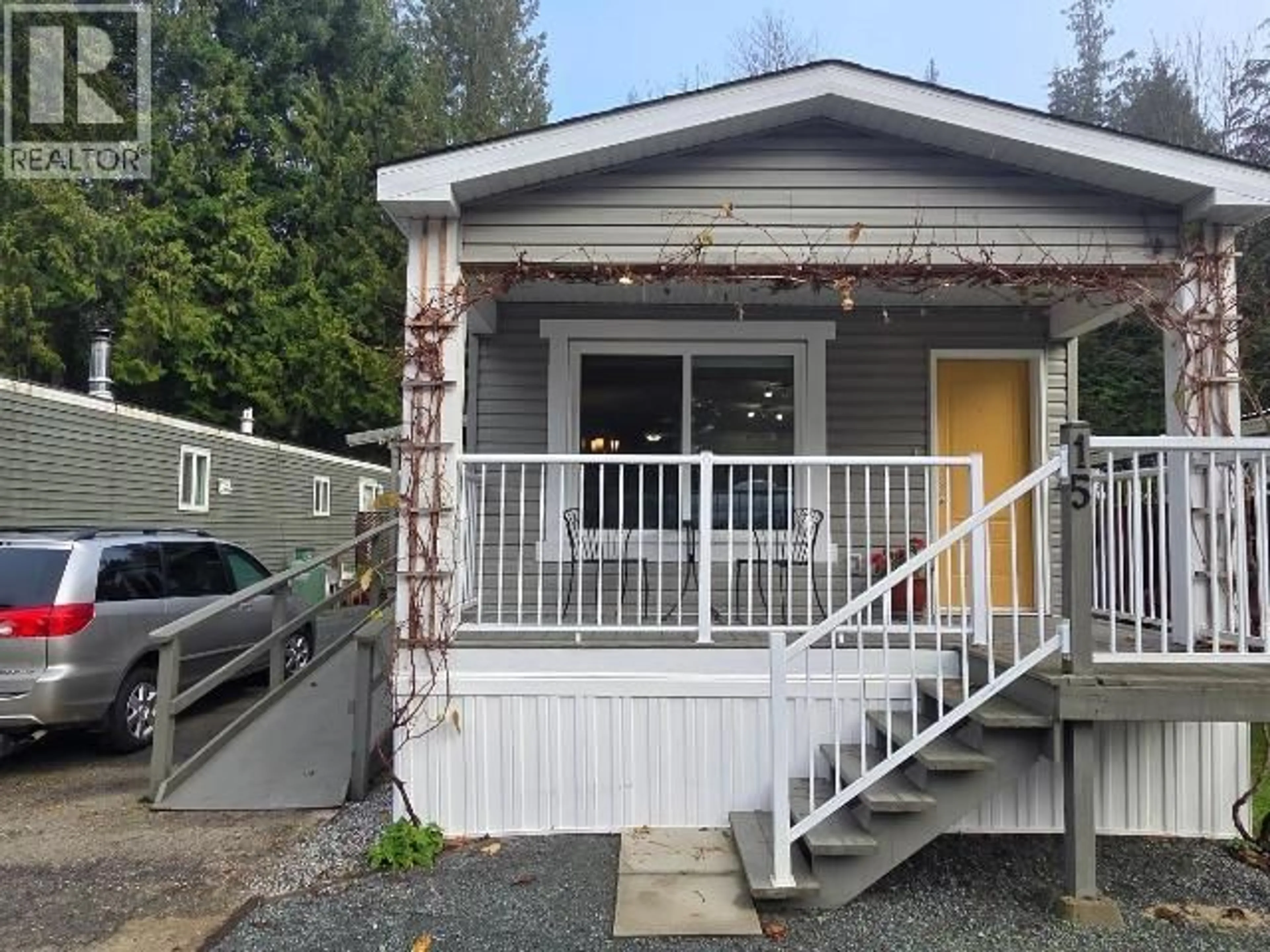 Home with vinyl exterior material, street for 15-8425 HIGHWAY 101, Powell River British Columbia