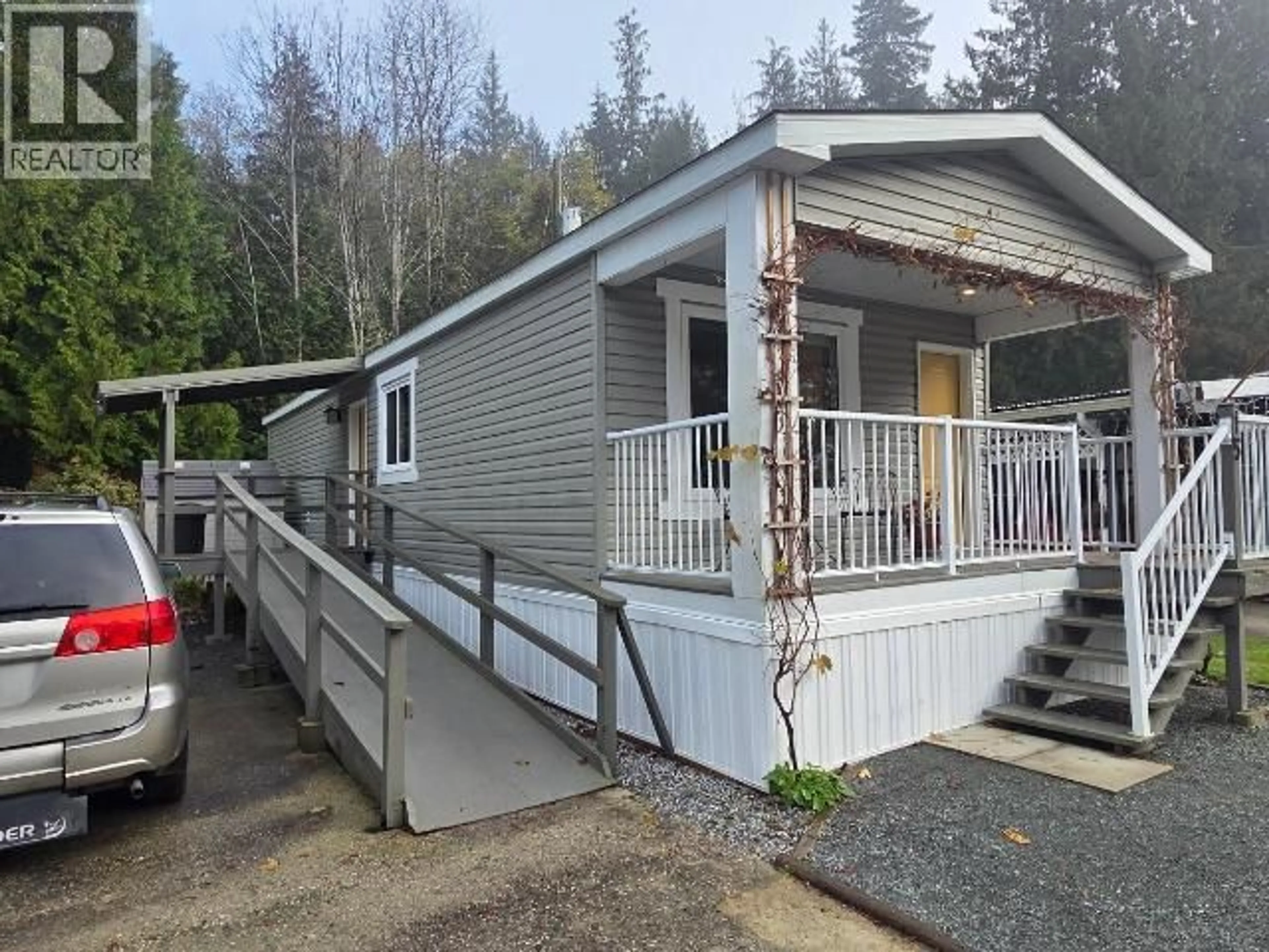 Home with vinyl exterior material, street for 15-8425 HIGHWAY 101, Powell River British Columbia