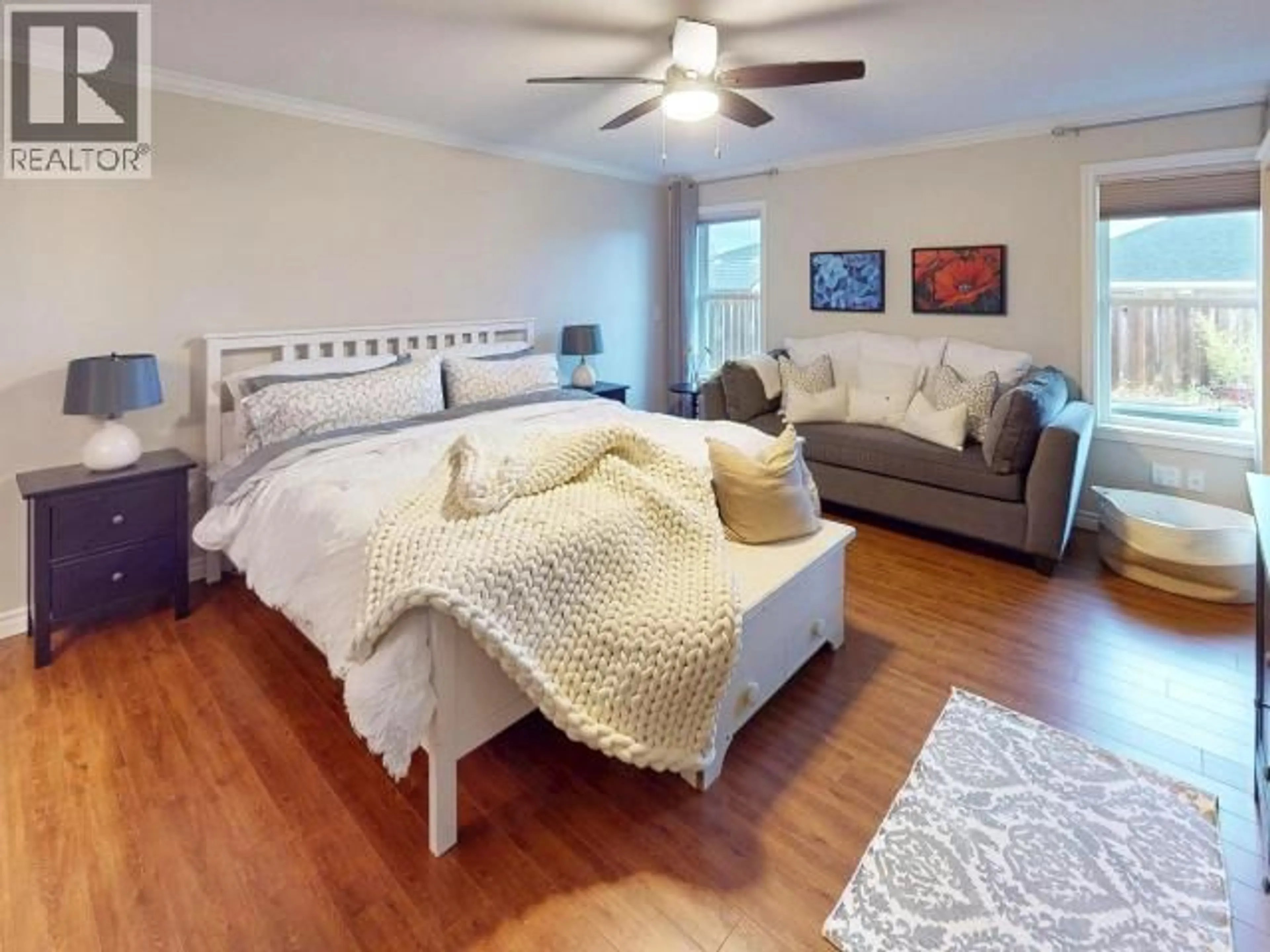 Bedroom with bed, wood/laminate floor for 7365 GLACIER STREET, Powell River British Columbia