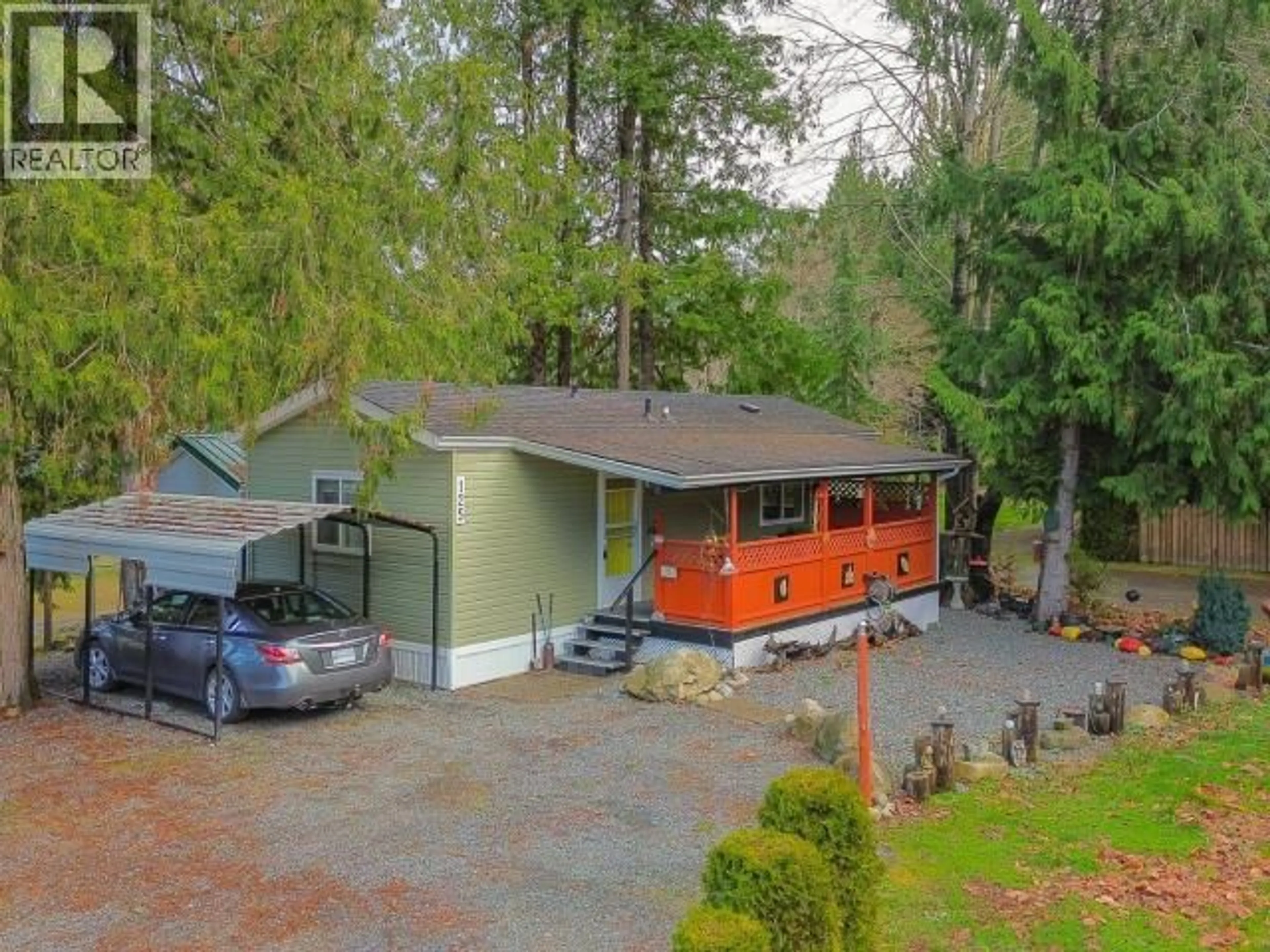 A pic from outside/outdoor area/front of a property/back of a property/a pic from drone, street for 8430 - 125 SPRINGBROOK ROAD, Powell River British Columbia V8A0S3
