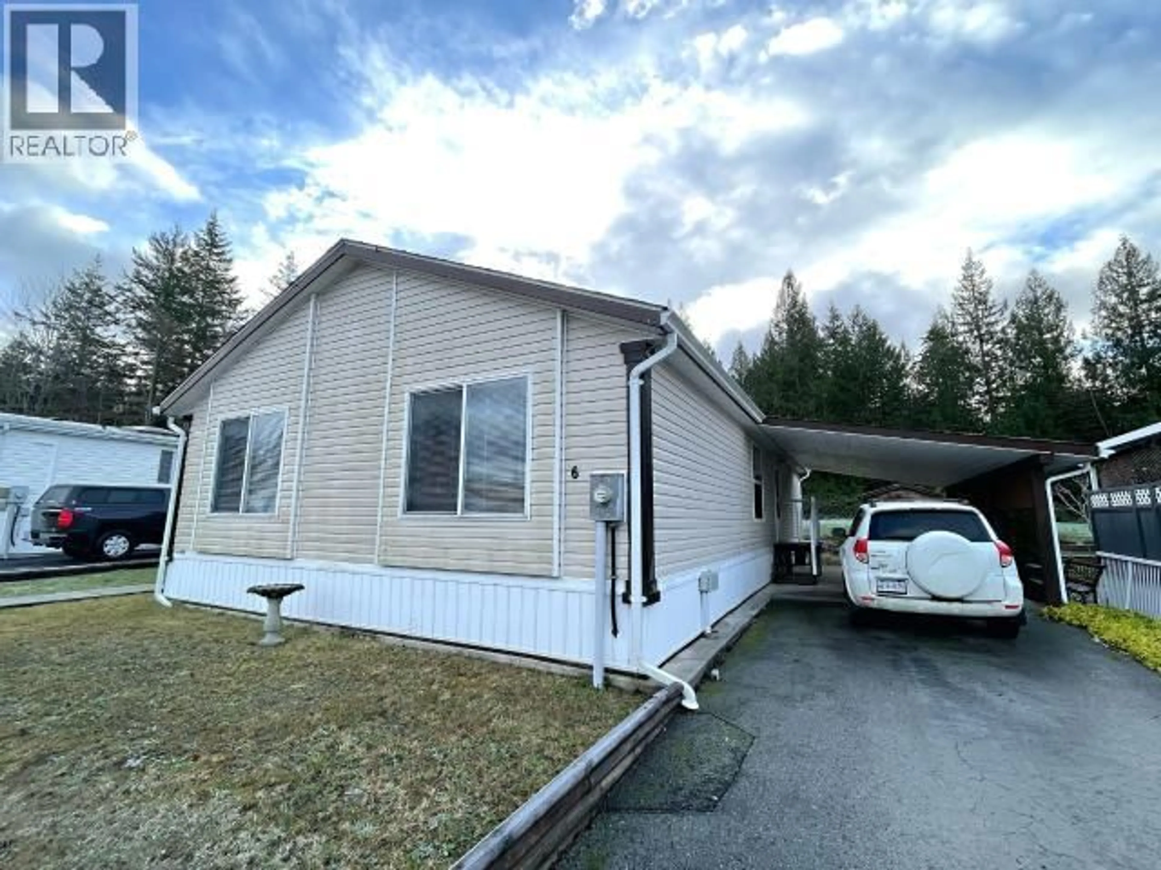Home with vinyl exterior material, street for 6 - 8442 SPRINGBROOK ROAD, Powell River British Columbia V8A4Z2