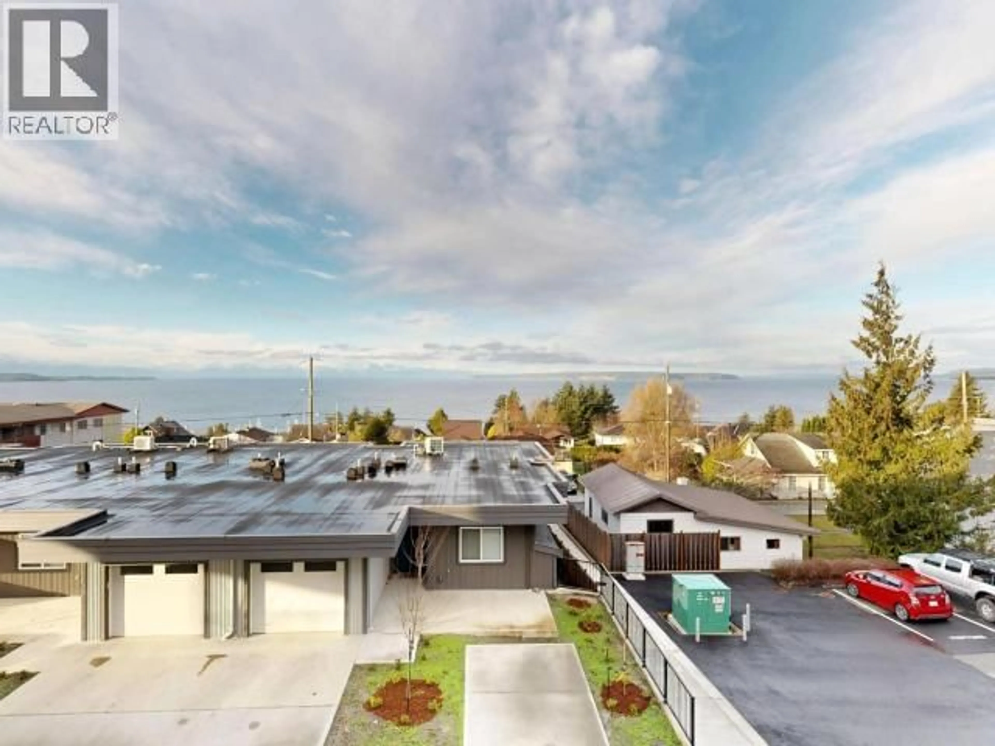 A pic from outside/outdoor area/front of a property/back of a property/a pic from drone, water/lake/river/ocean view for C201 - 6900 BURNABY STREET, Powell River British Columbia