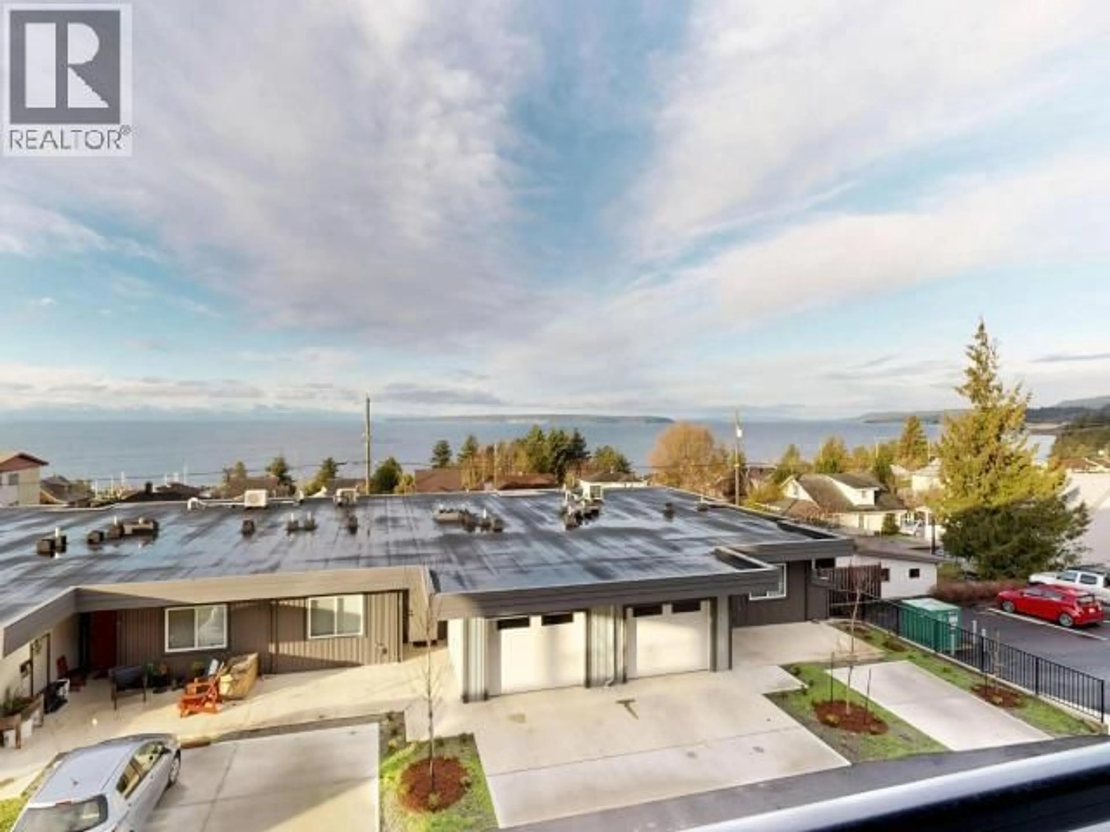 A pic from outside/outdoor area/front of a property/back of a property/a pic from drone, water/lake/river/ocean view for C202 - 6900 BURNABY STREET, Powell River British Columbia
