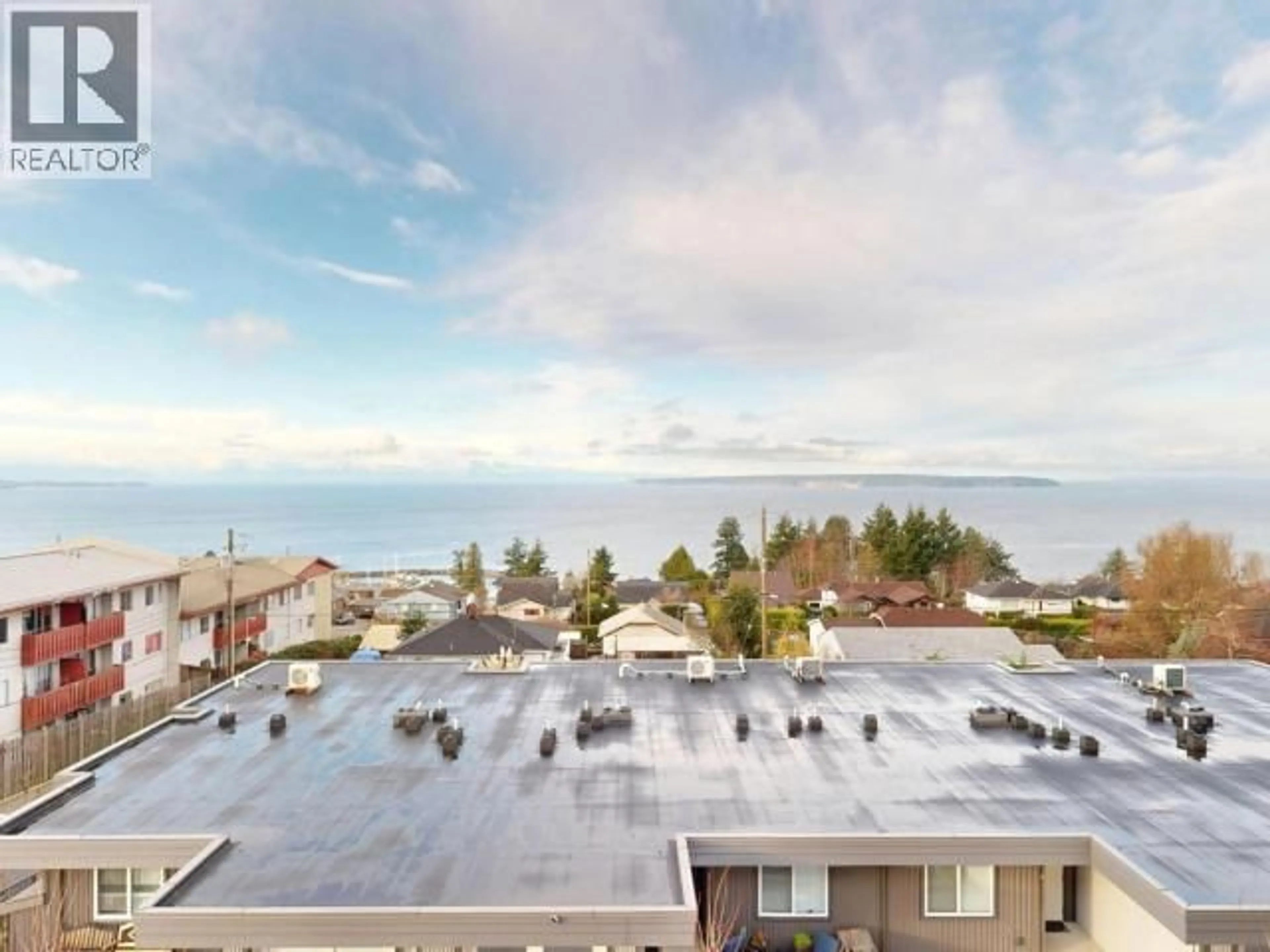A pic from outside/outdoor area/front of a property/back of a property/a pic from drone, water/lake/river/ocean view for C303 - 6900 BURNABY STREET, Powell River British Columbia