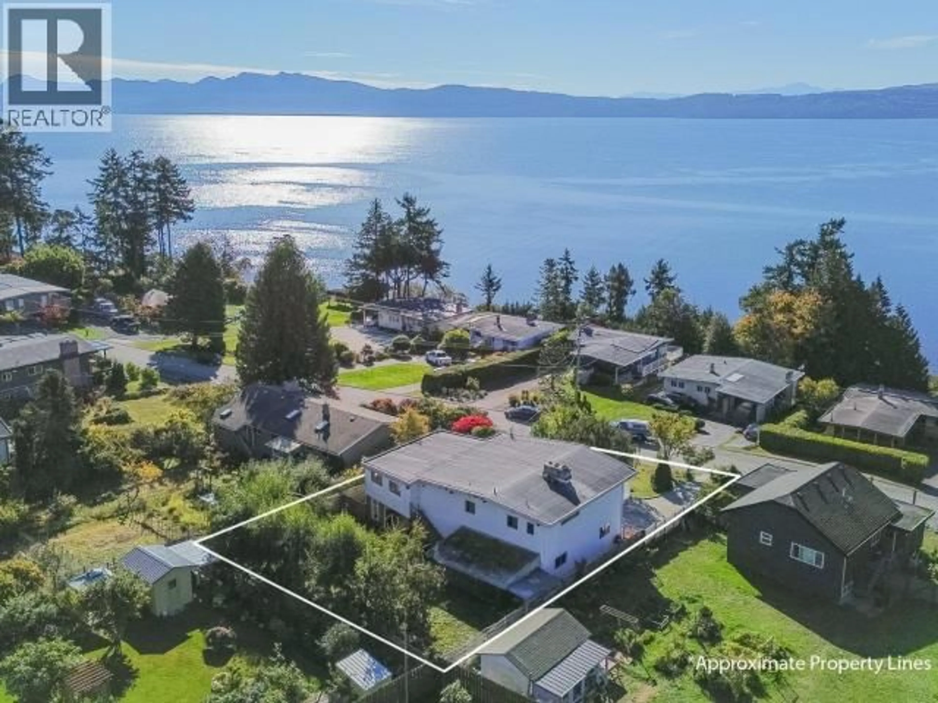 A pic from outside/outdoor area/front of a property/back of a property/a pic from drone, water/lake/river/ocean view for 7173 WESTMINSTER STREET, Powell River British Columbia V8A1C7