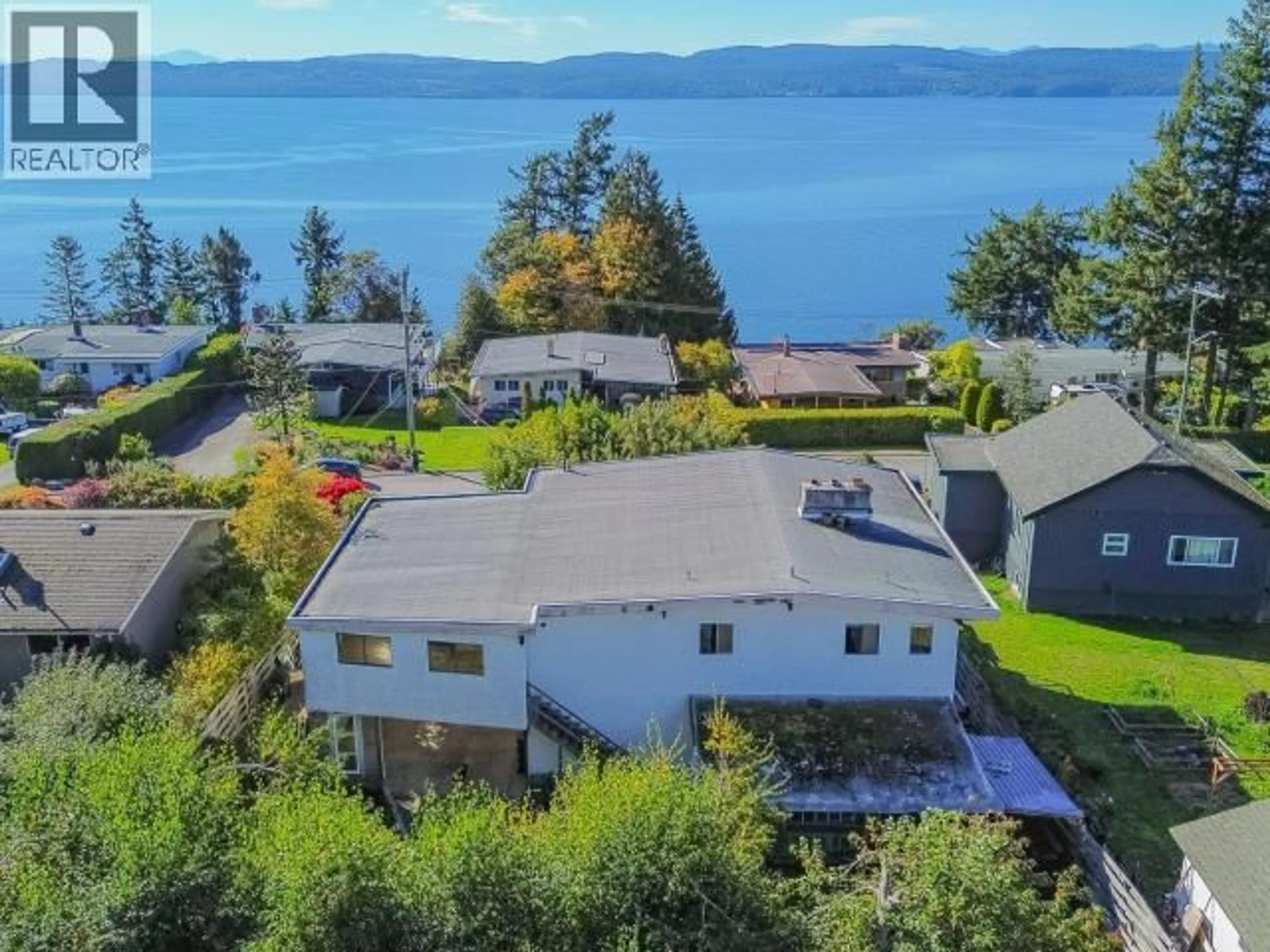 A pic from outside/outdoor area/front of a property/back of a property/a pic from drone, water/lake/river/ocean view for 7173 WESTMINSTER STREET, Powell River British Columbia V8A1C7