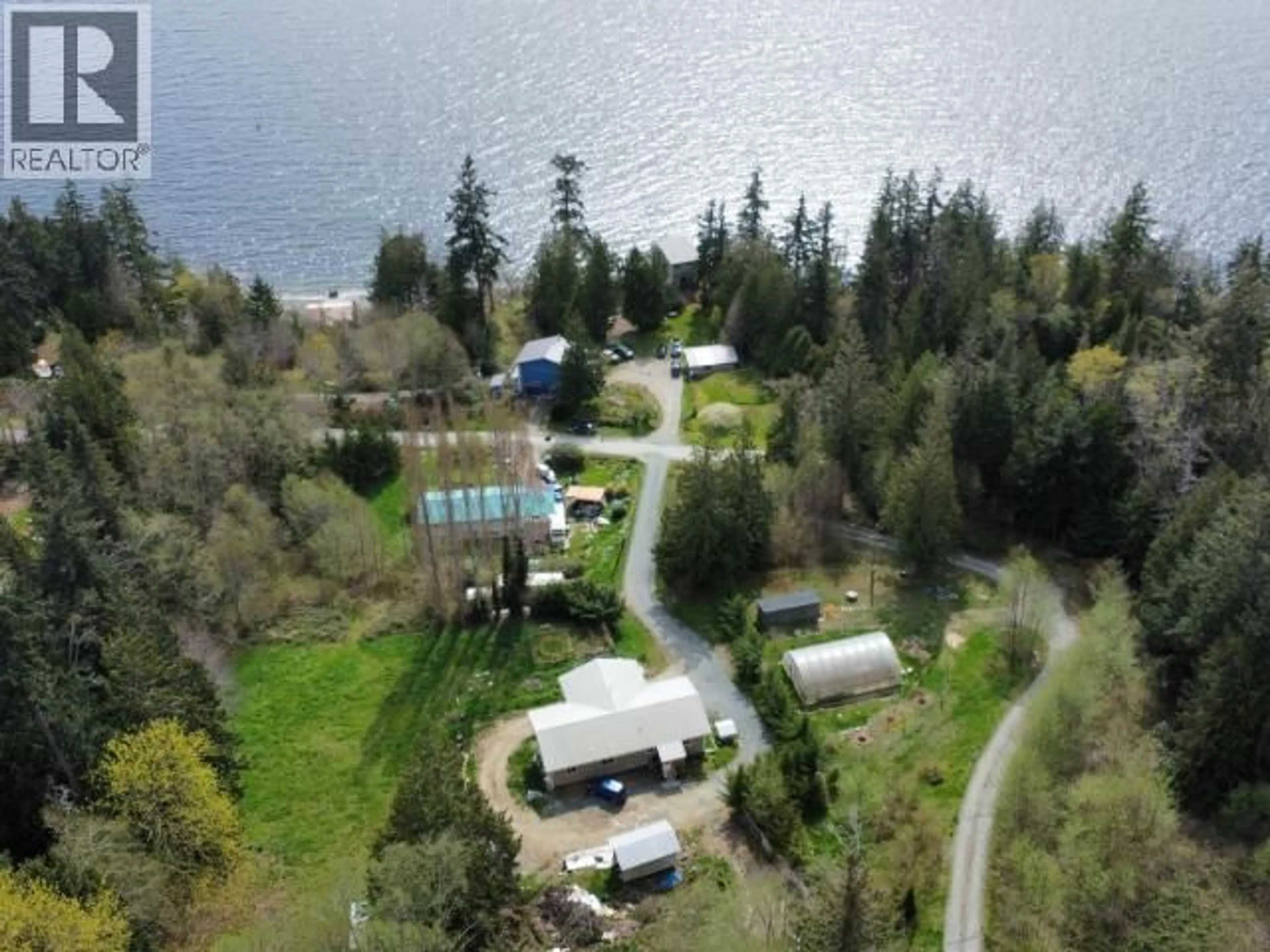 A pic from outside/outdoor area/front of a property/back of a property/a pic from drone, water/lake/river/ocean view for 3431 ATREVIDA ROAD, Powell River British Columbia