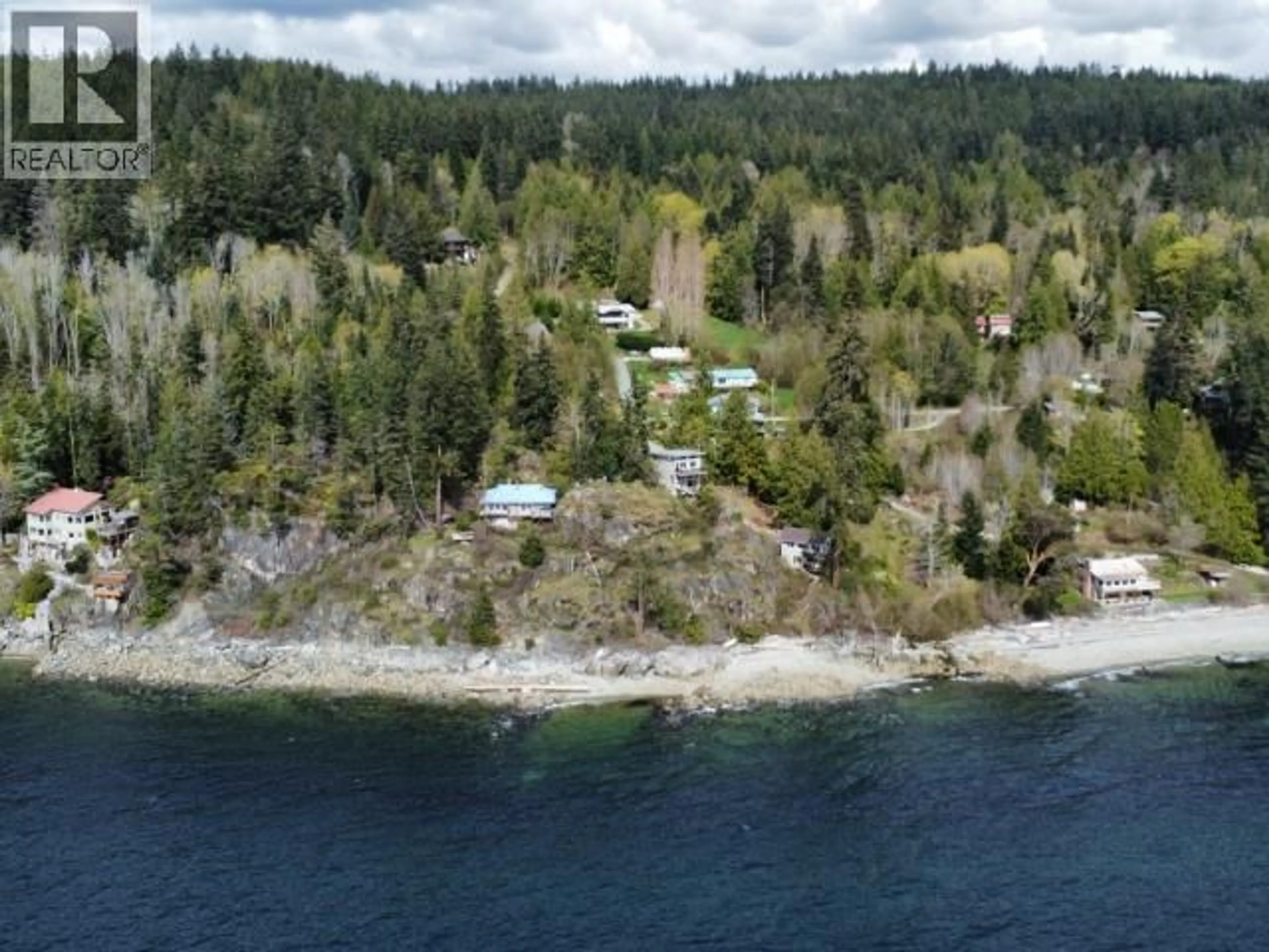A pic from outside/outdoor area/front of a property/back of a property/a pic from drone, water/lake/river/ocean view for 3431 ATREVIDA ROAD, Powell River British Columbia