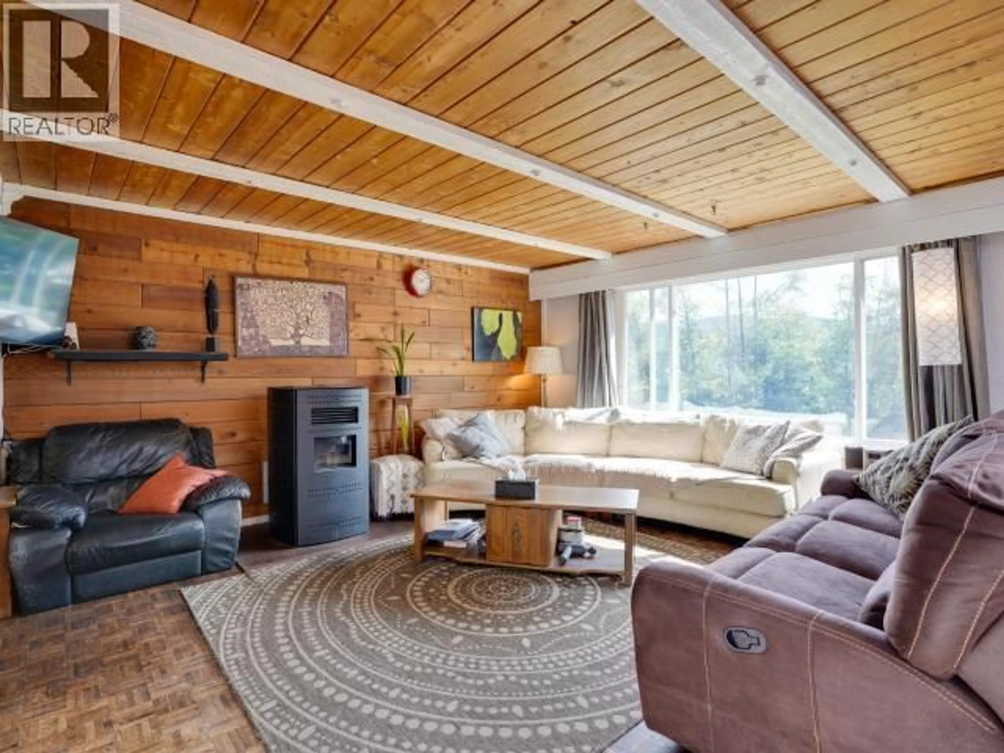 Living room with furniture, wood/laminate floor for 3008 ASH STREET, Texada Island British Columbia V0N1W0