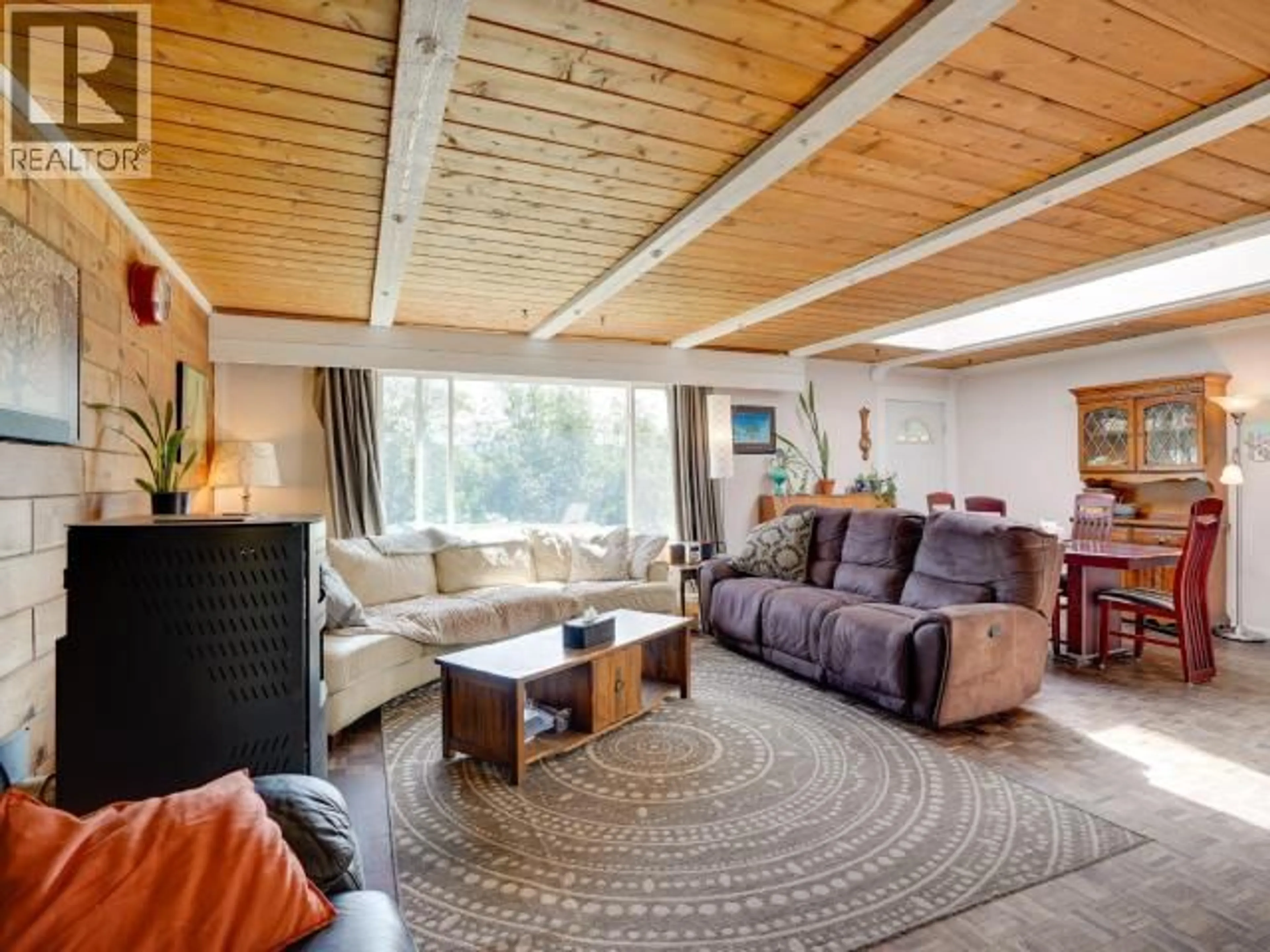 Living room with furniture, wood/laminate floor for 3008 ASH STREET, Texada Island British Columbia V0N1W0