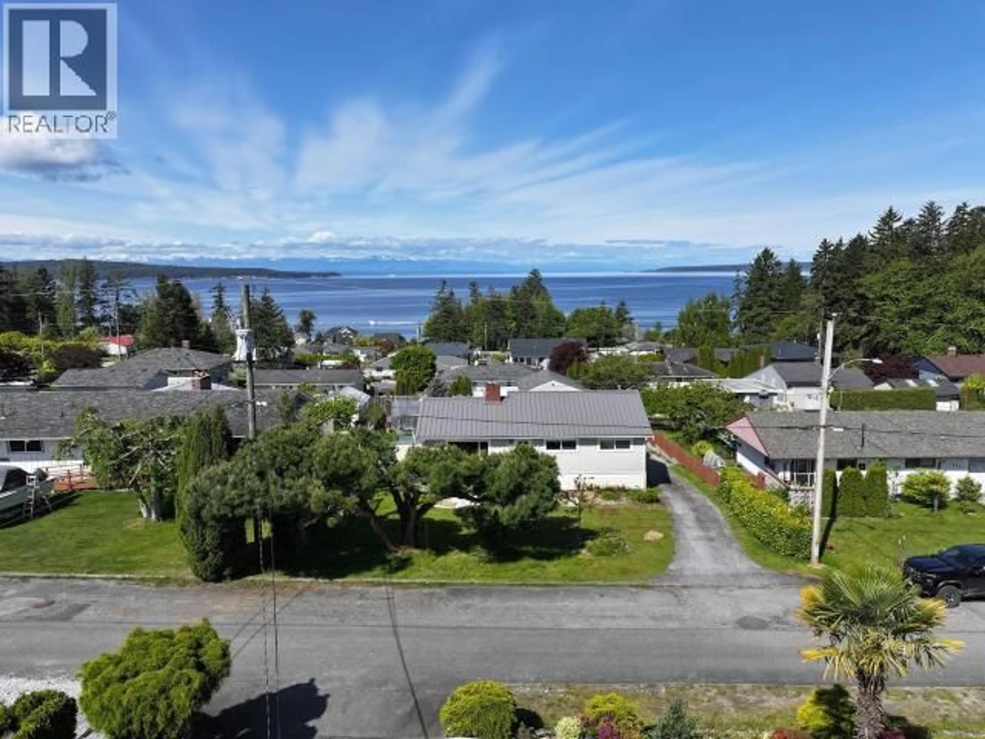 A pic from outside/outdoor area/front of a property/back of a property/a pic from drone, water/lake/river/ocean view for 3616 MANITOBA AVE, Powell River British Columbia V8A2W2