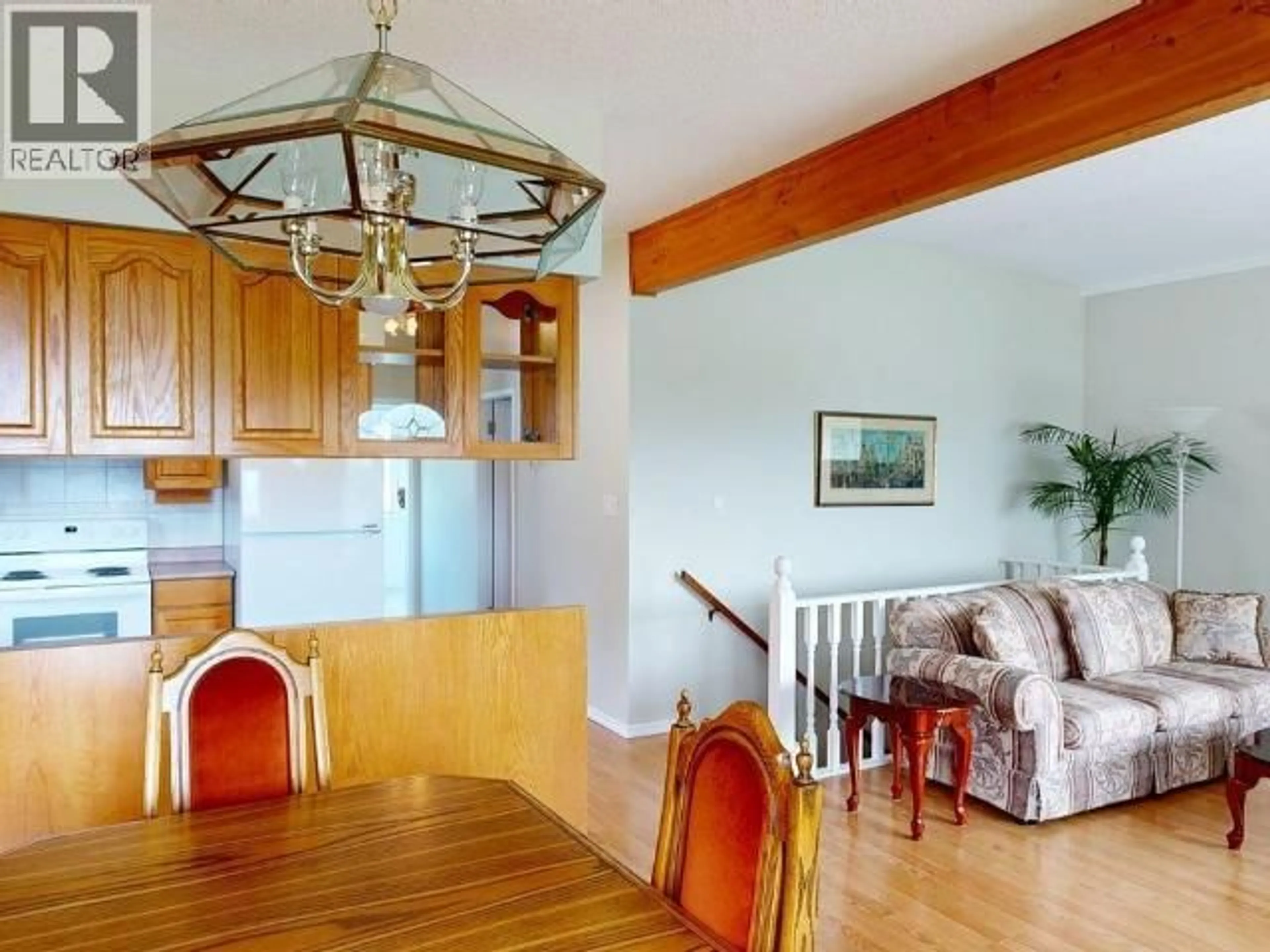 Open concept kitchen, wood/laminate floor for 3616 MANITOBA AVE, Powell River British Columbia V8A2W2