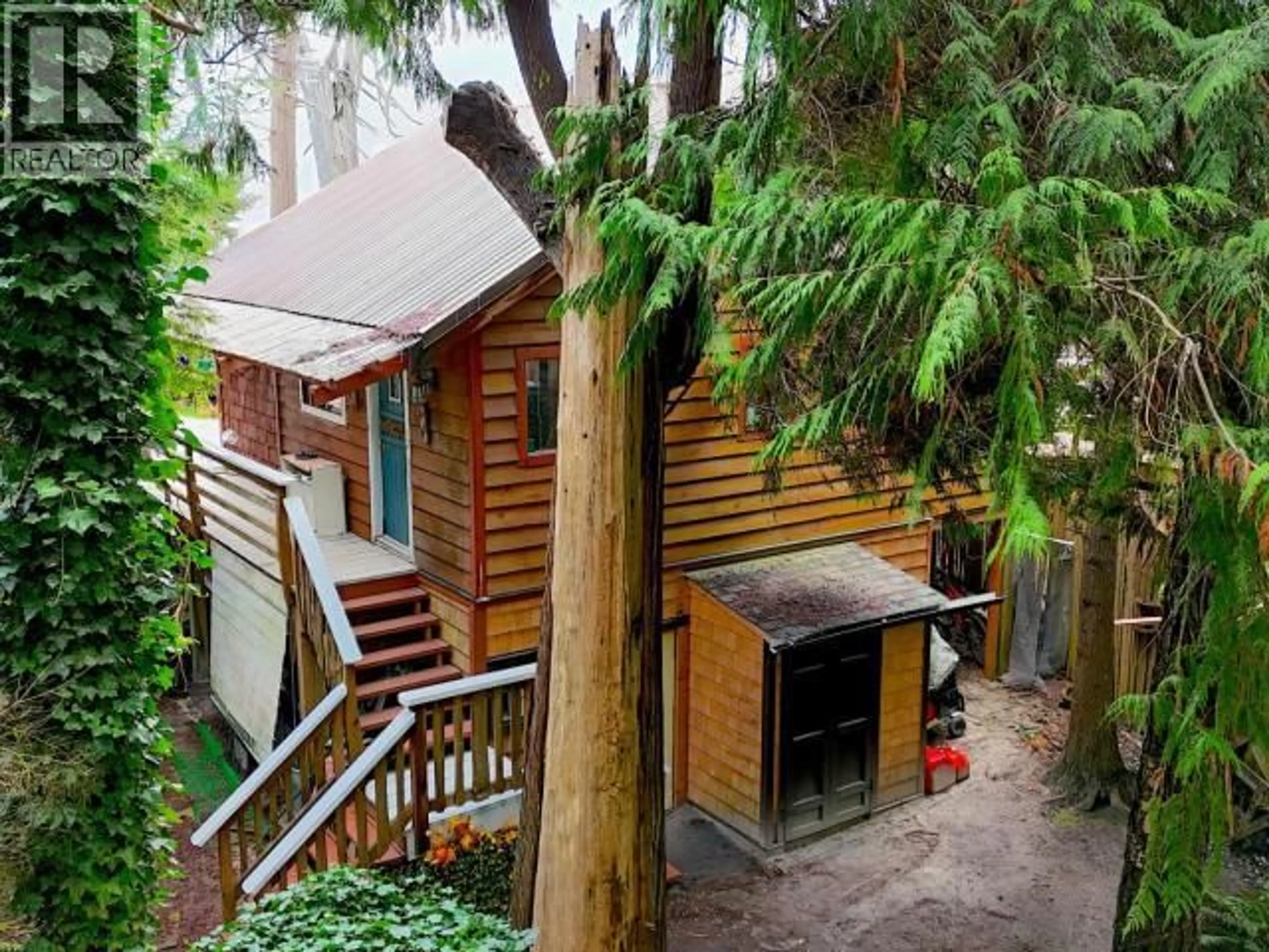 A pic from outside/outdoor area/front of a property/back of a property/a pic from drone, forest/trees view for 08 - 1716 VANCOUVER BLVD, Savary Island British Columbia