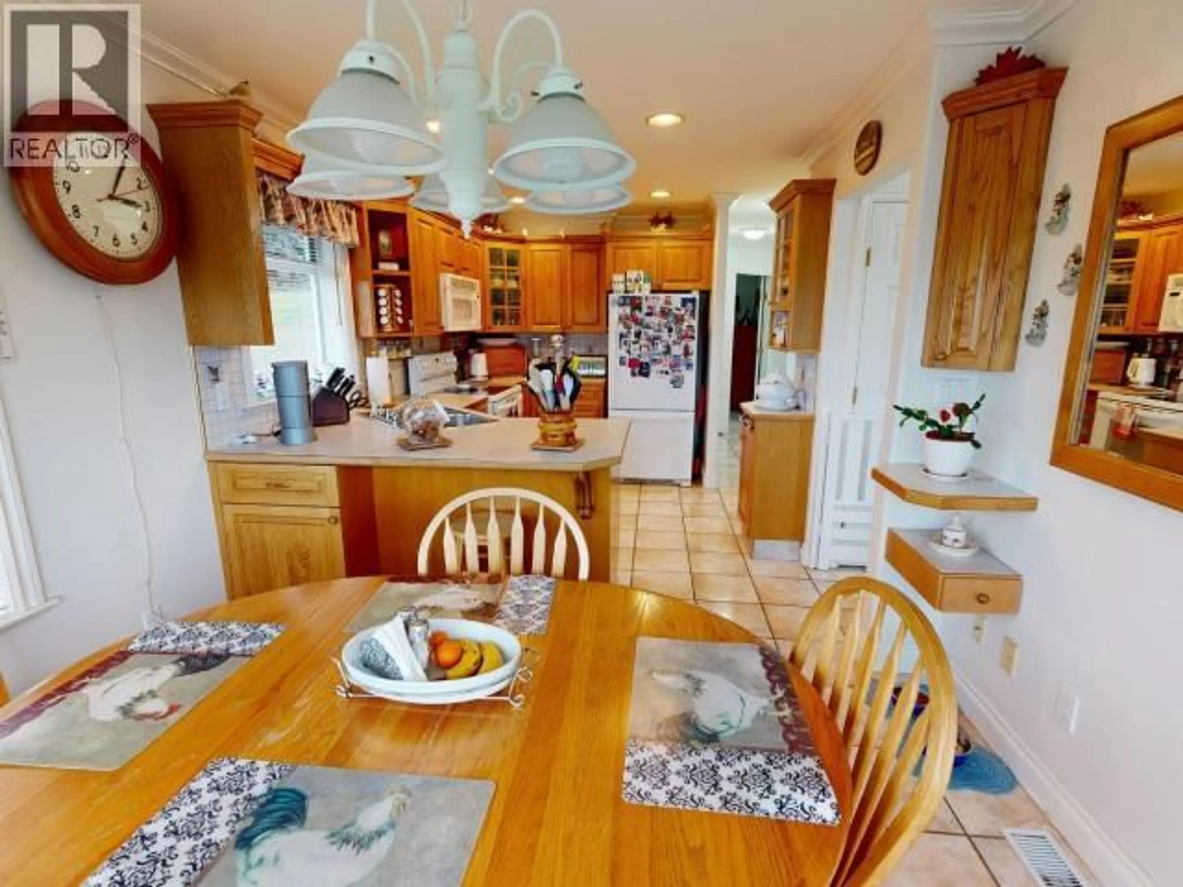 Open concept kitchen, ceramic/tile floor for 6945 RETASKIT CRT, Powell River British Columbia