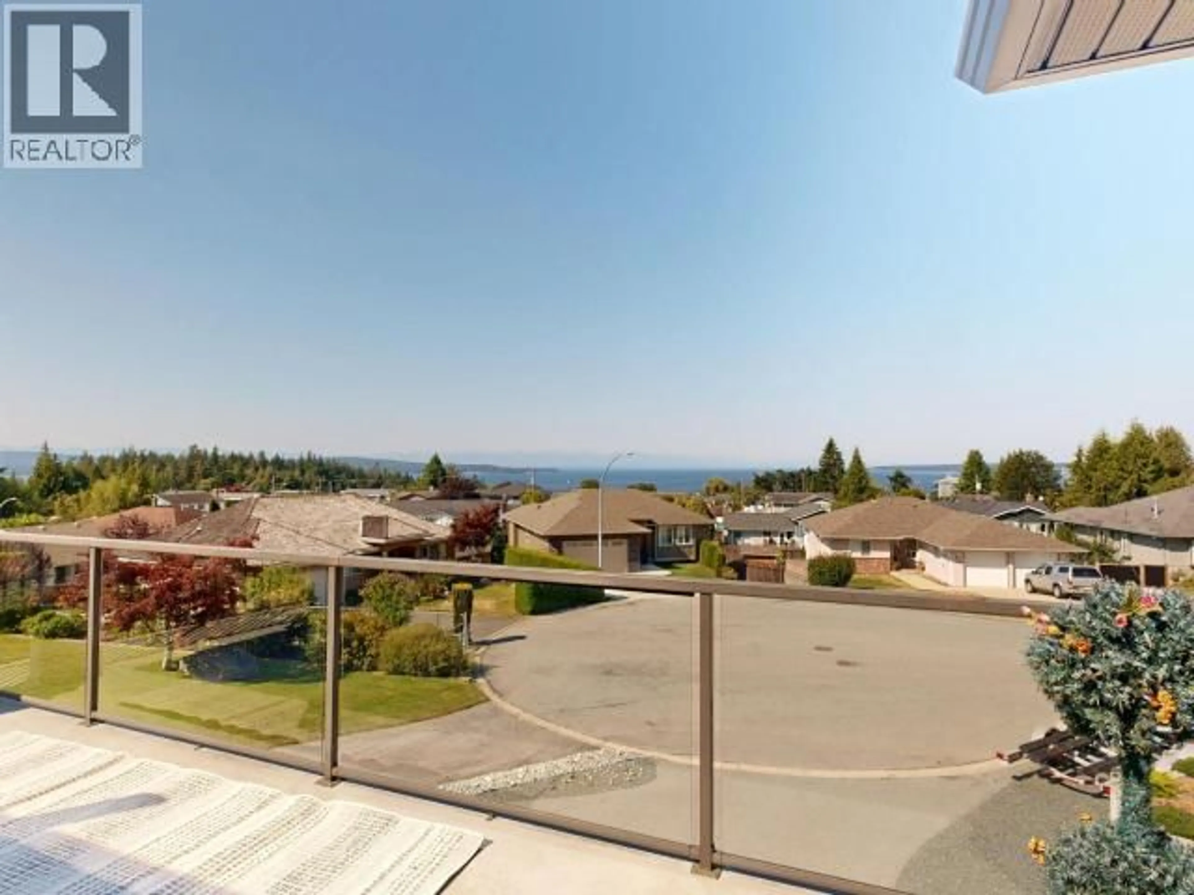 A pic from outside/outdoor area/front of a property/back of a property/a pic from drone, water/lake/river/ocean view for 3784 TRAIL PLACE, Powell River British Columbia V8A5L3