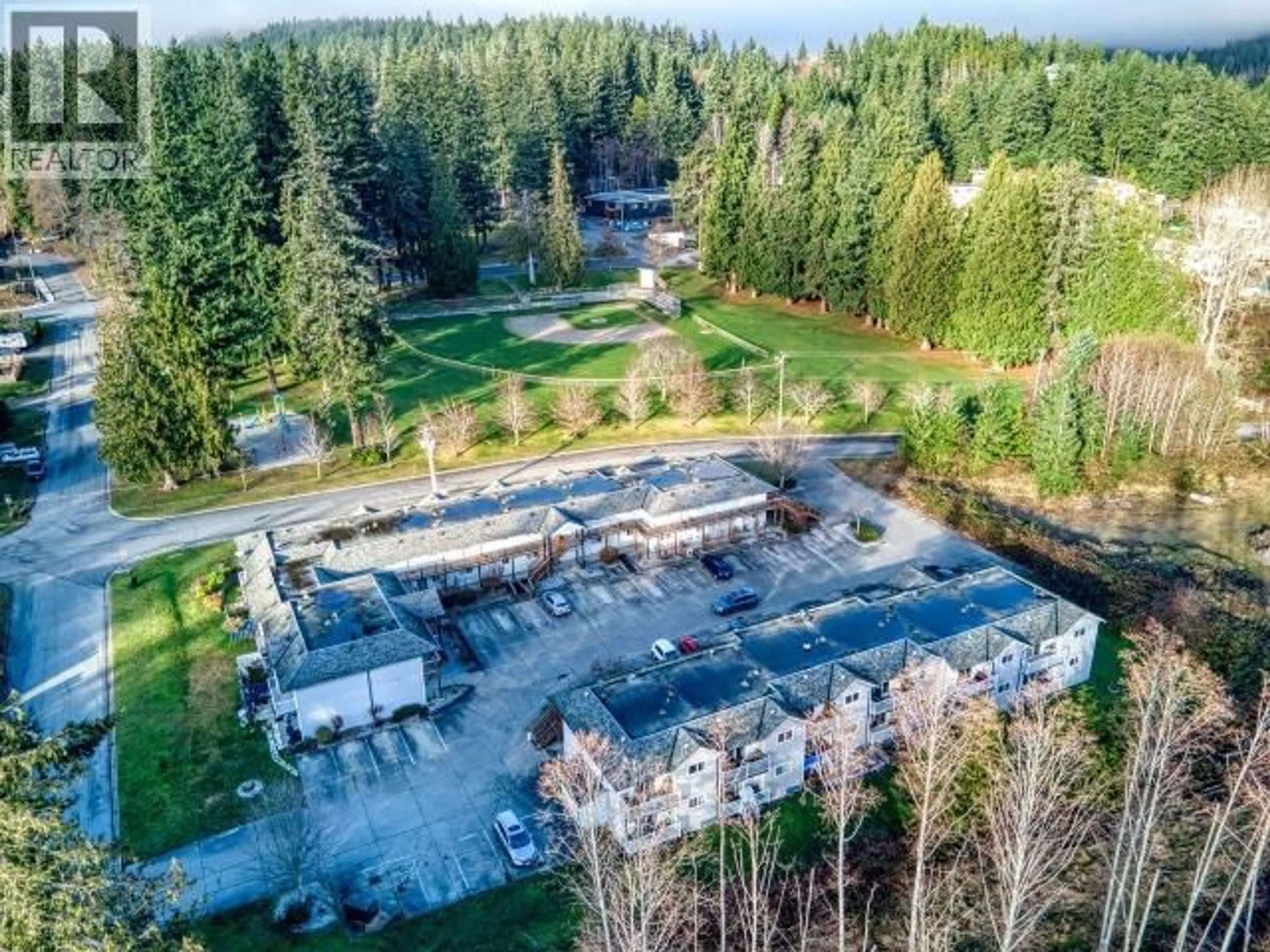 A pic from outside/outdoor area/front of a property/back of a property/a pic from drone, unknown for 201 - 5680 ORTONA AVE, Powell River British Columbia