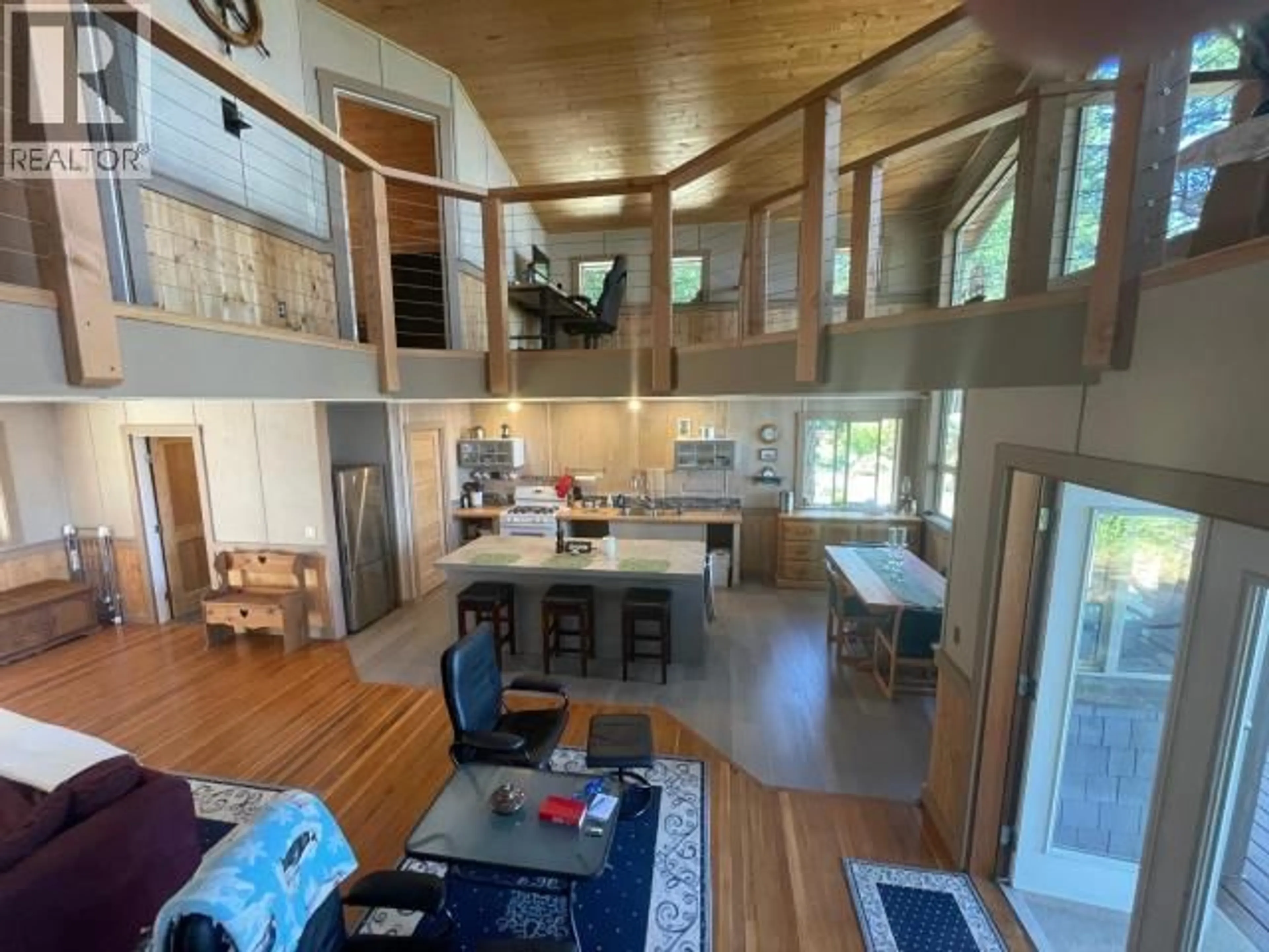 Open concept kitchen, wood/laminate floor for 1474 SAVARY ISLAND RD, Savary Island British Columbia V0N2G0