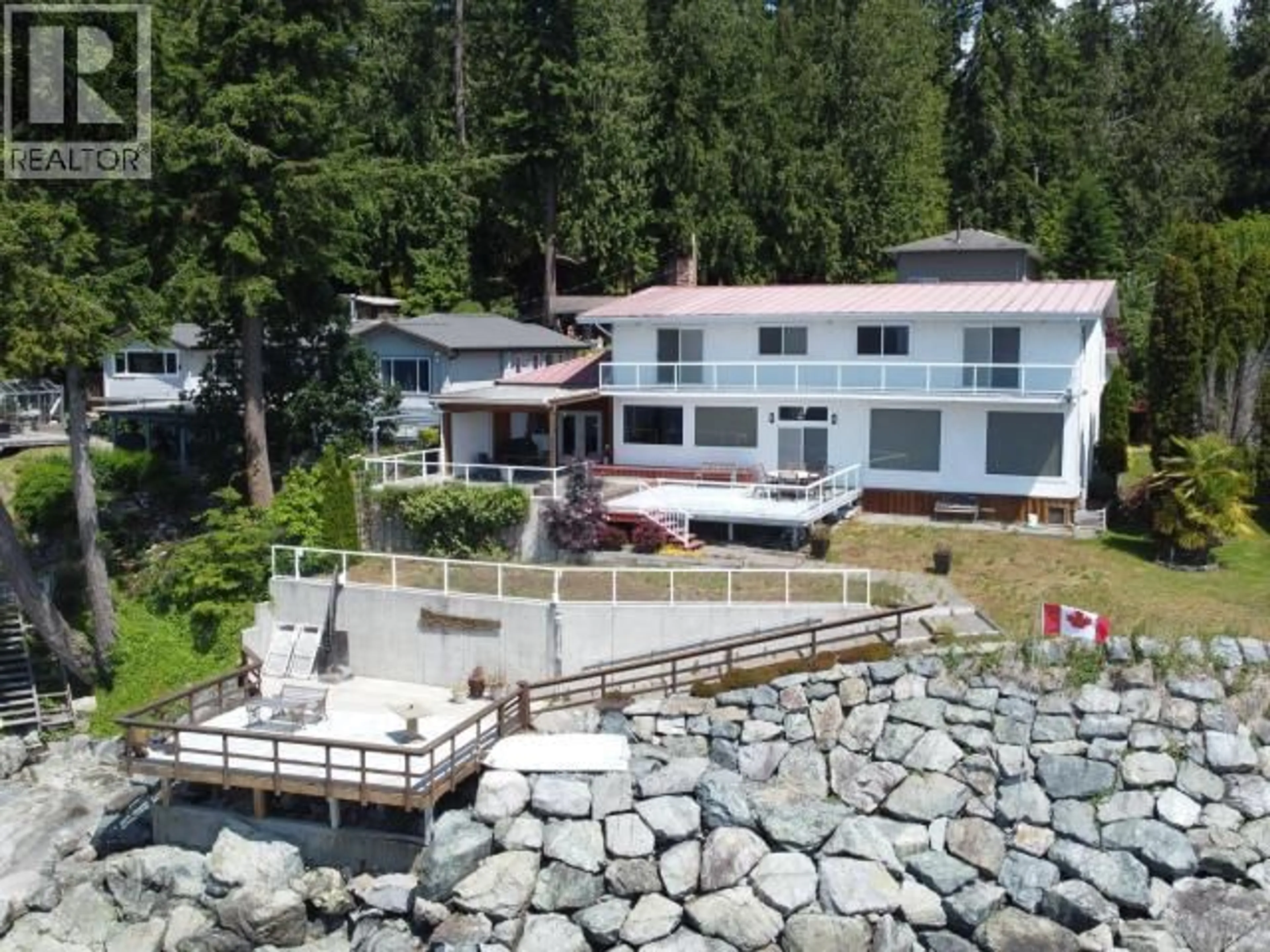 A pic from outside/outdoor area/front of a property/back of a property/a pic from drone, water/lake/river/ocean view for 7397 STURT ROAD, Powell River British Columbia V8A0C8
