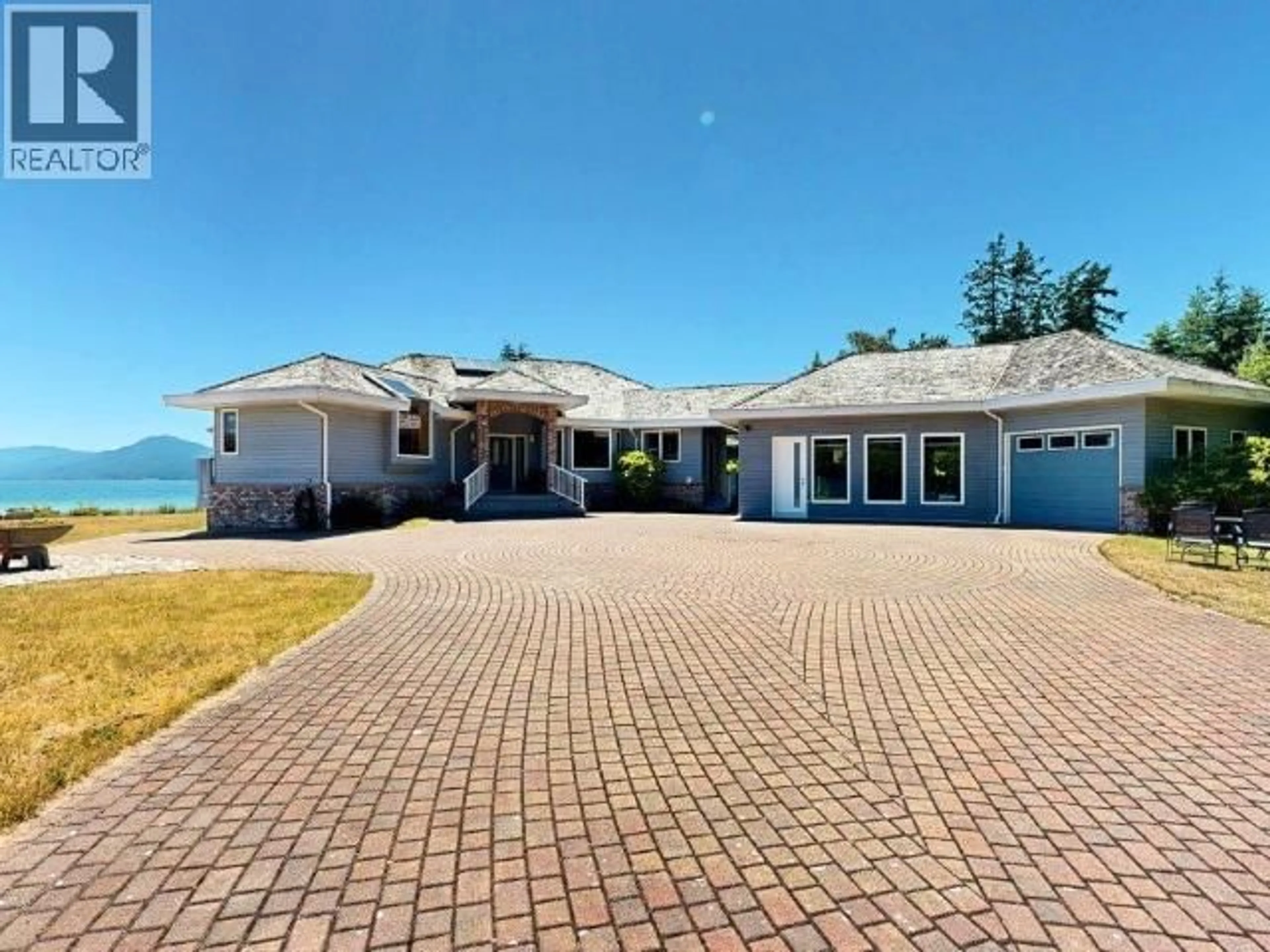 A pic from outside/outdoor area/front of a property/back of a property/a pic from drone, unknown for 10219 DOUGLAS BAY ROAD, Powell River British Columbia V8A0K7