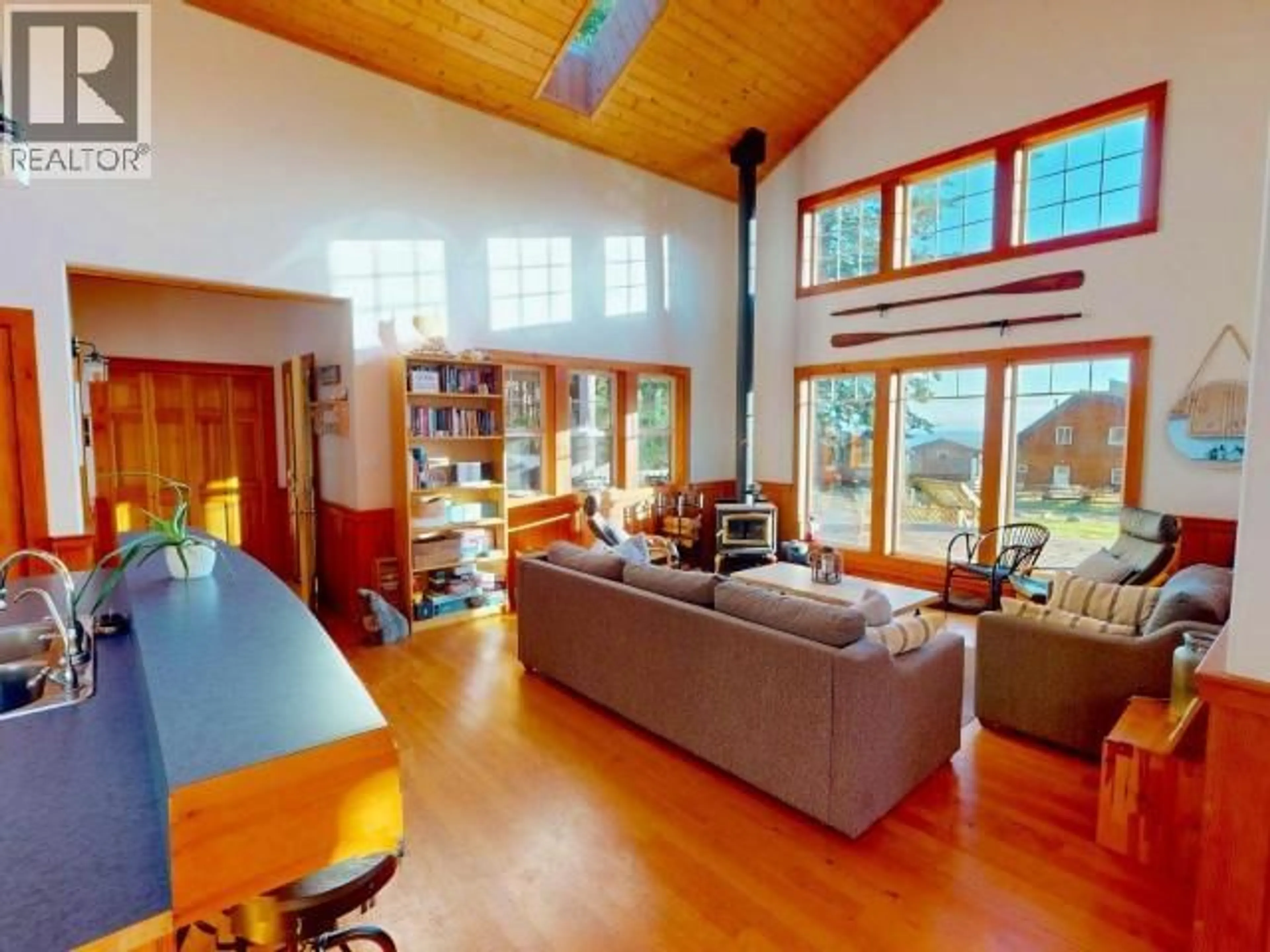 Living room with furniture, wood/laminate floor for 1266/68 TENNYSON RD, Savary Island British Columbia