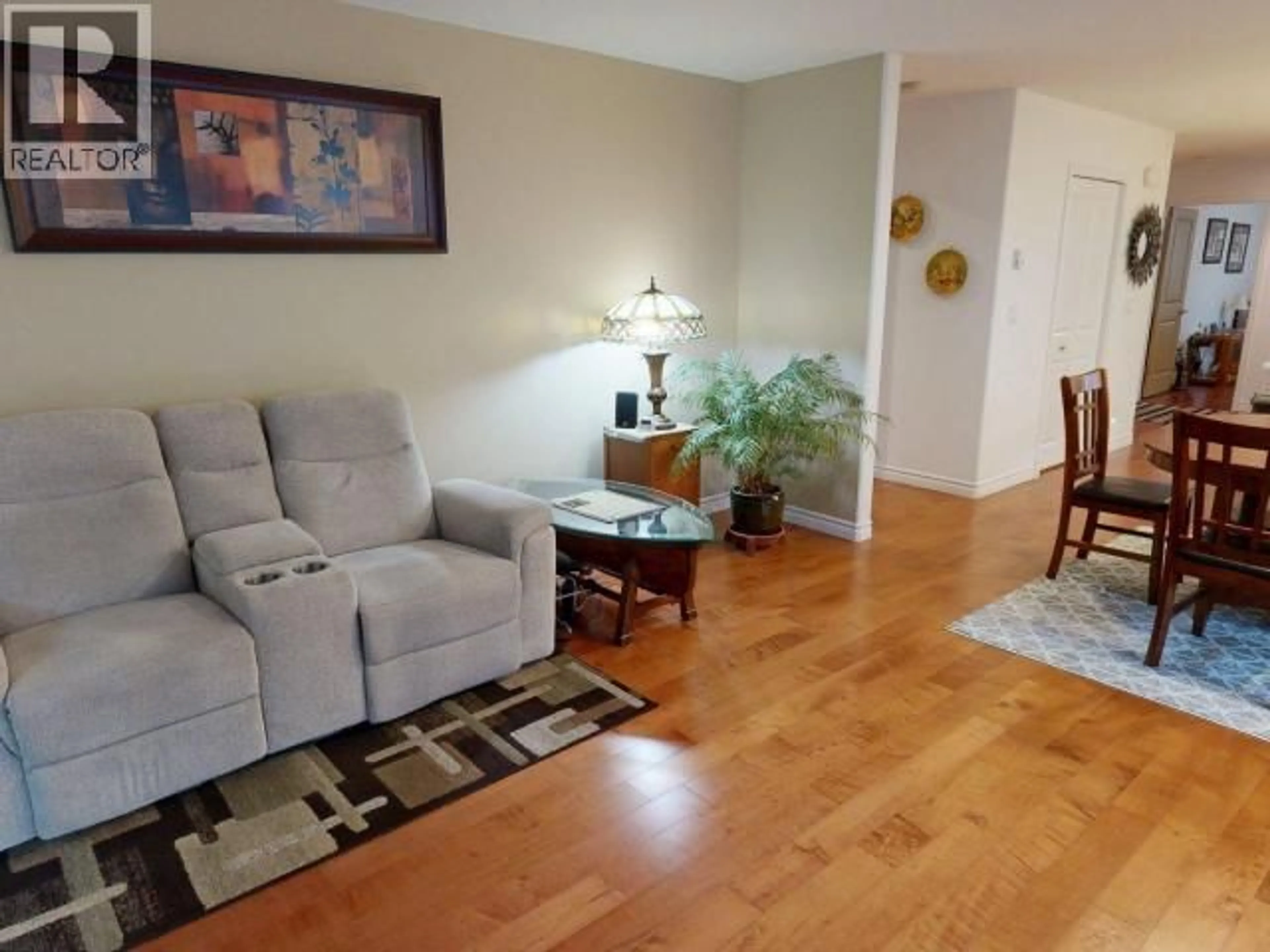 Living room with furniture, wood/laminate floor for 24 - 4415 MANSON AVE, Powell River British Columbia V8A0A5