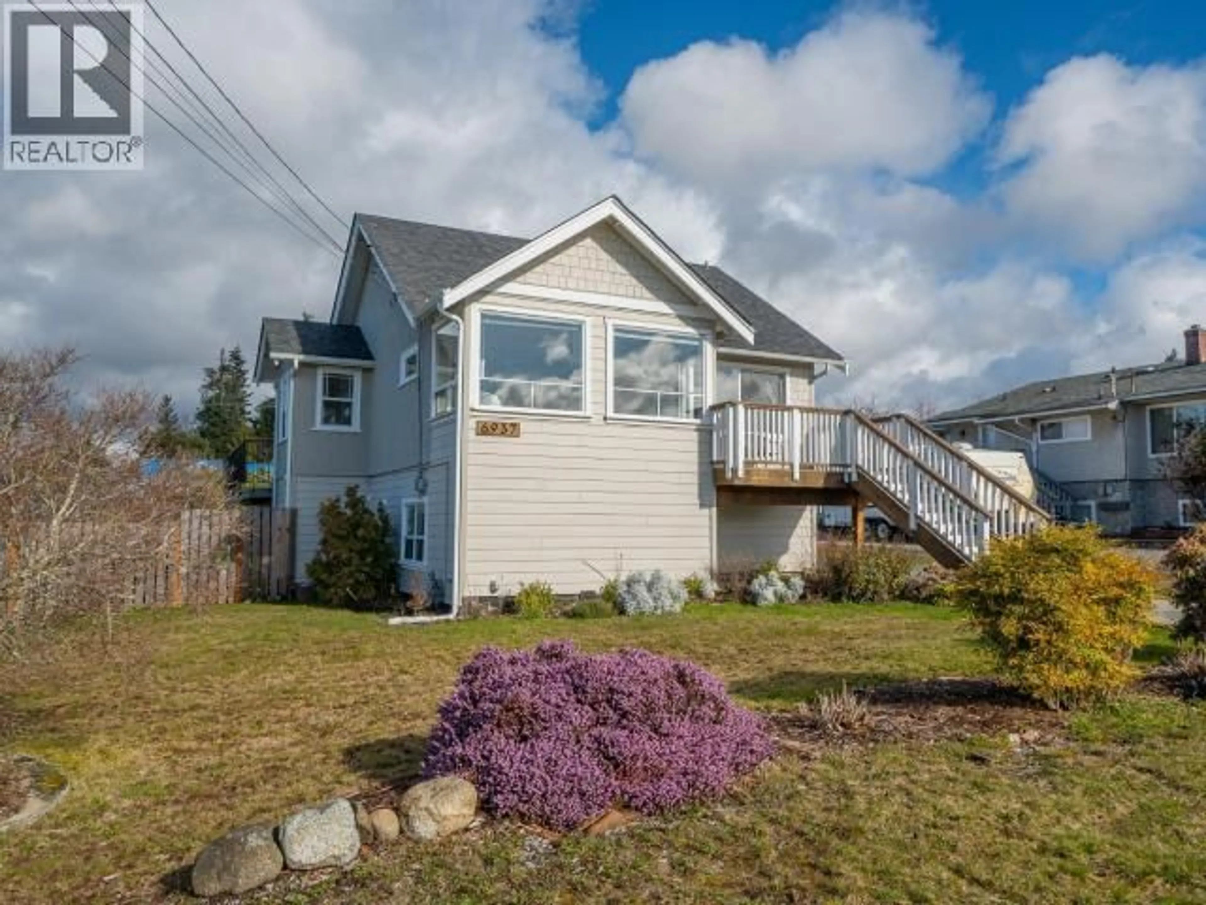 Home with vinyl exterior material, street for 6937 JASPER STREET, Powell River British Columbia V8A1N4
