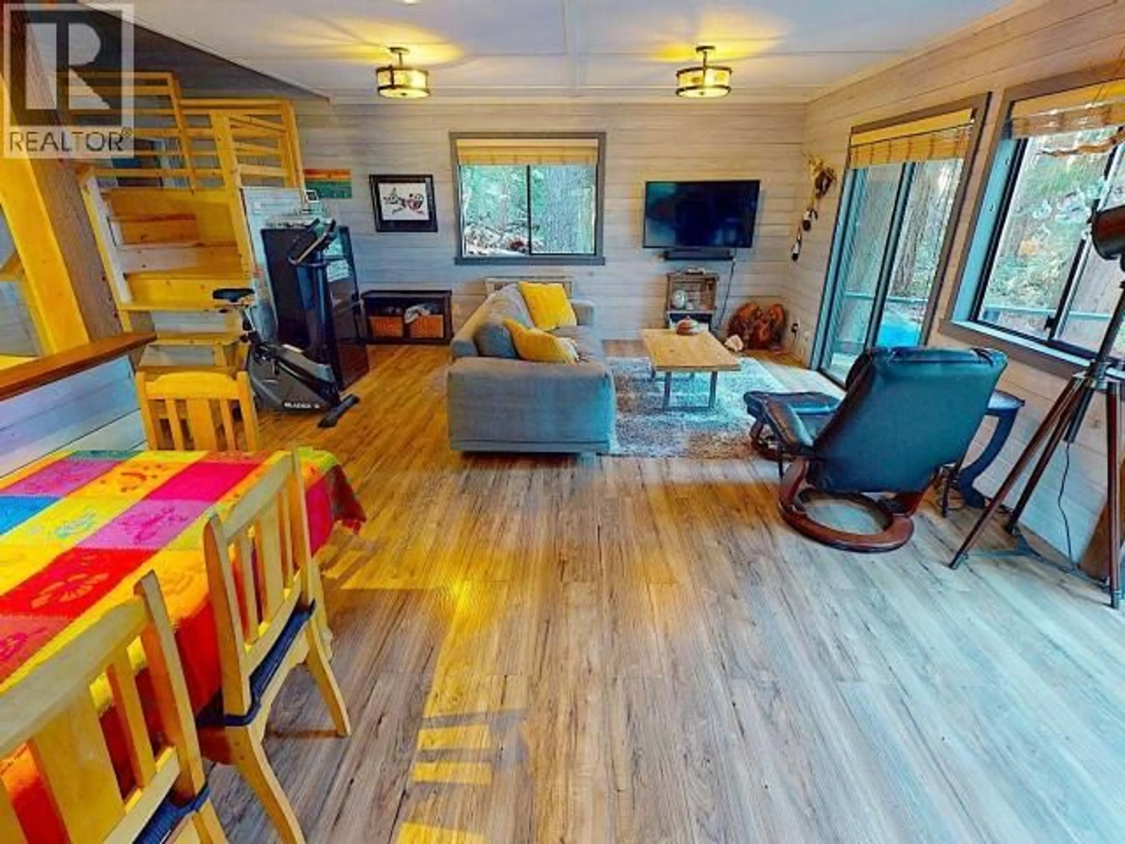 Living room with furniture, wood/laminate floor for 1283 TENNYSON RD, Savary Island British Columbia