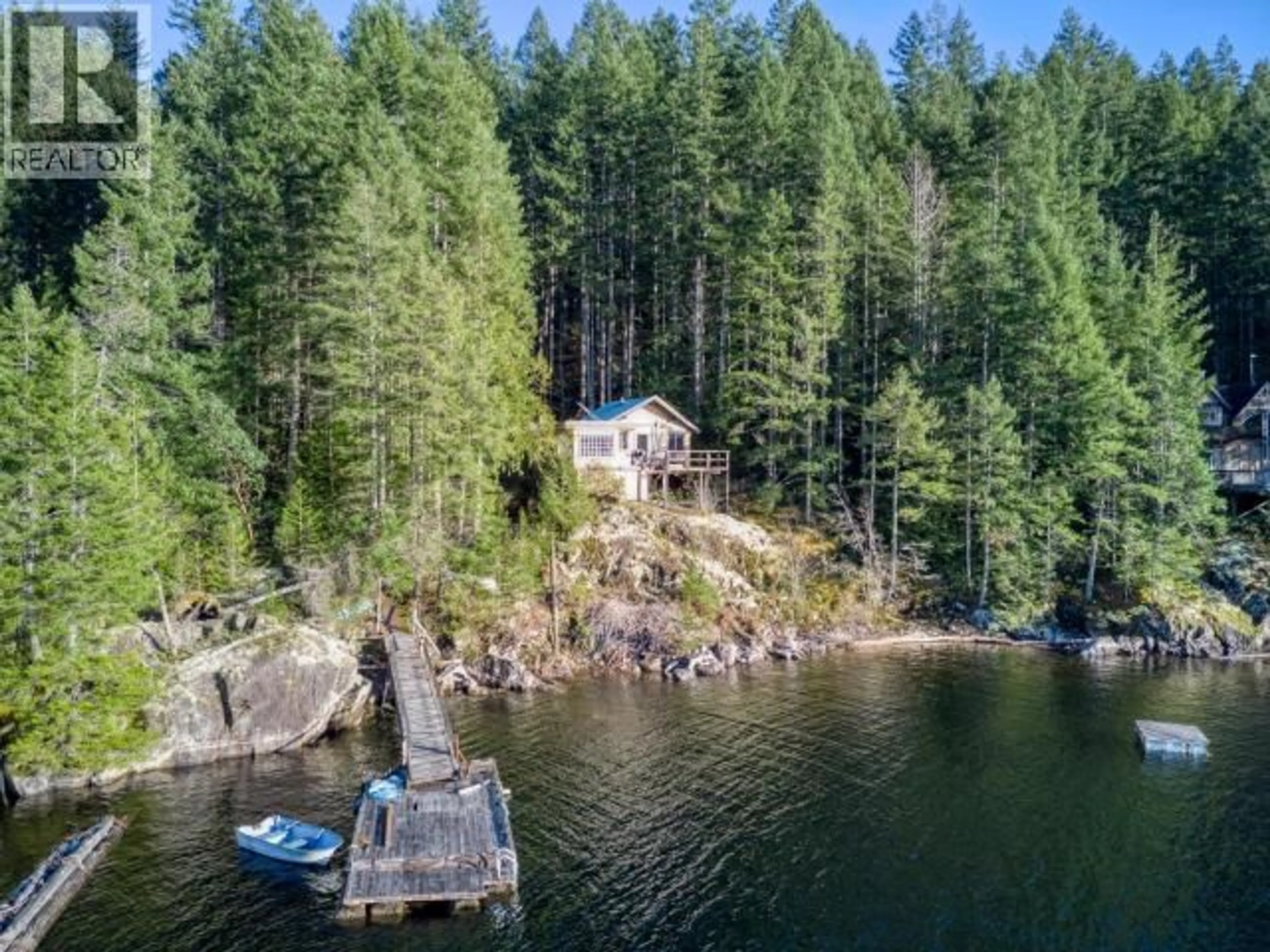 A pic from outside/outdoor area/front of a property/back of a property/a pic from drone, water/lake/river/ocean view for 9302 POWELL LAKE, Powell River British Columbia