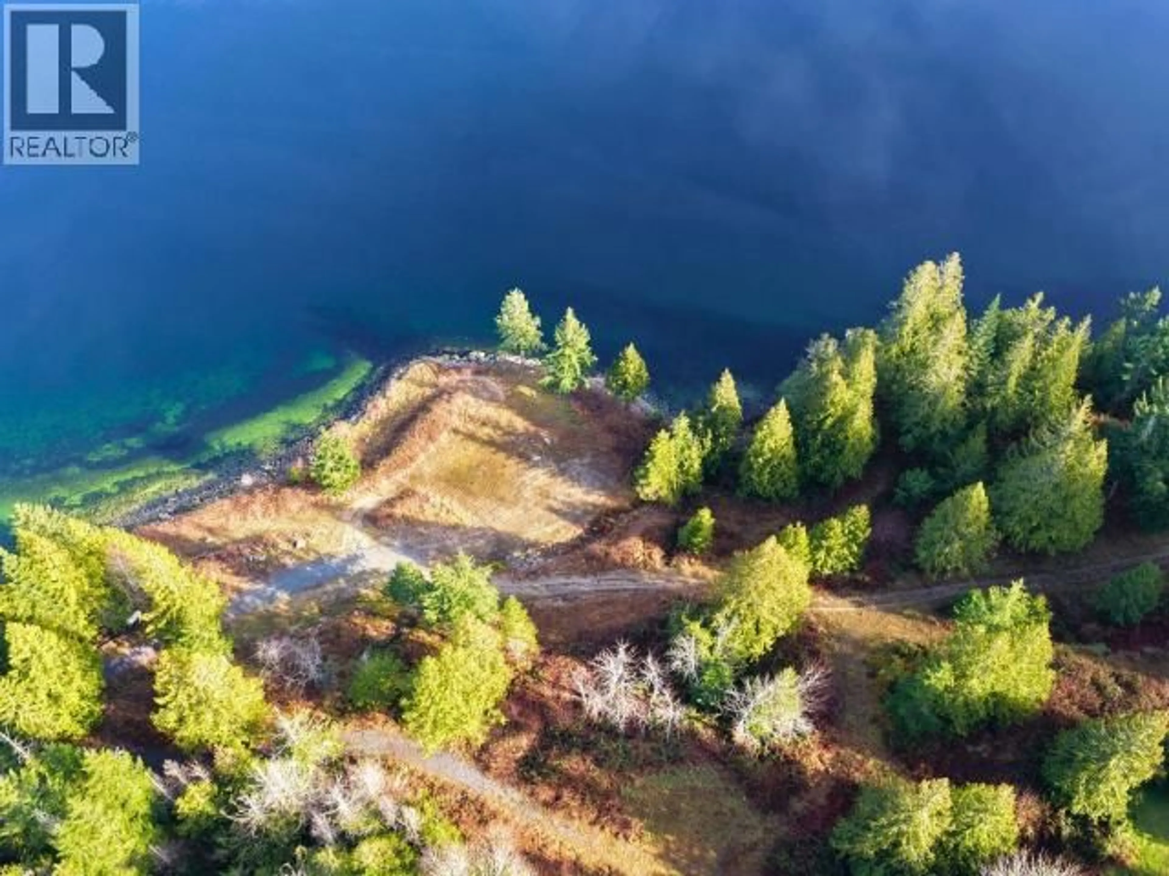 A pic from outside/outdoor area/front of a property/back of a property/a pic from drone, water/lake/river/ocean view for 2960 D'ANGIO RD, Powell River British Columbia