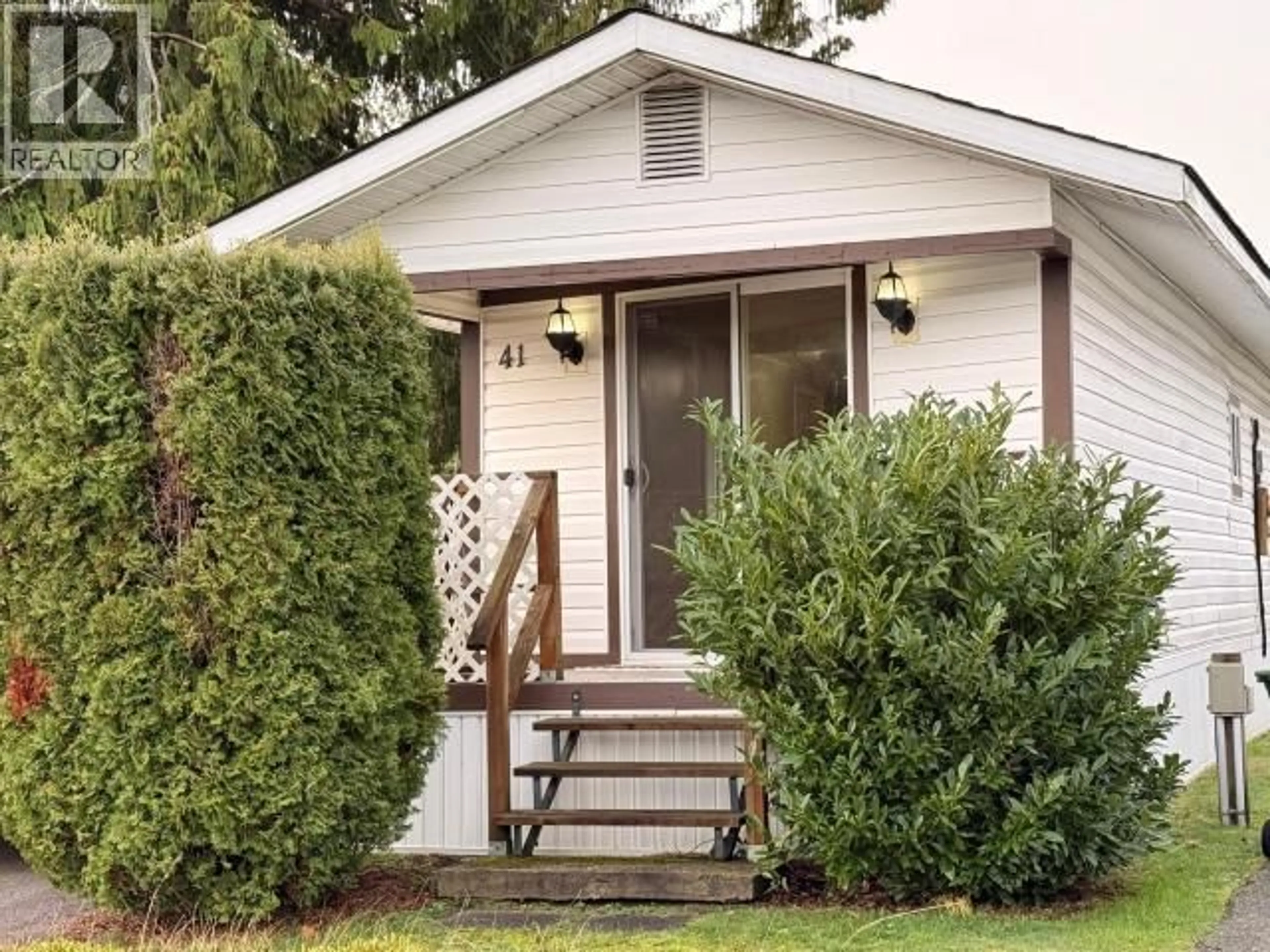 Home with vinyl exterior material, street for 41-7624 DUNCAN STREET, Powell River British Columbia V8A5L2