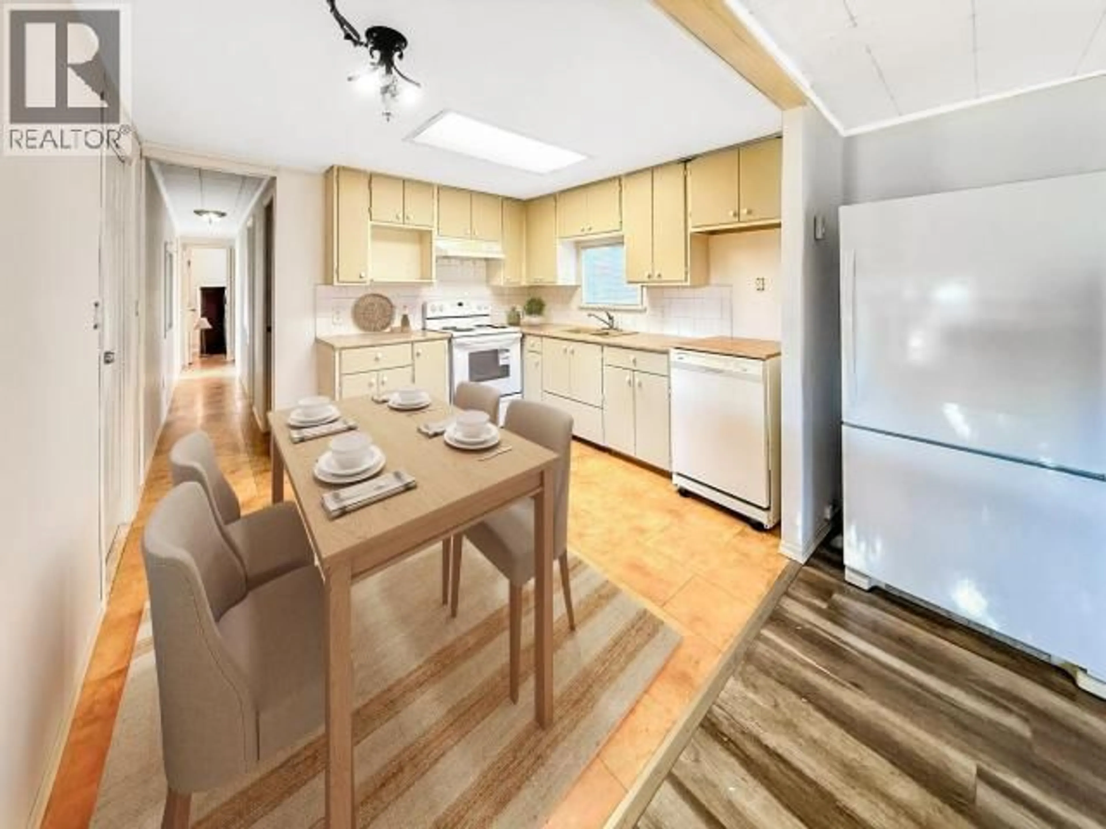 Open concept kitchen, wood/laminate floor for 41-7624 DUNCAN STREET, Powell River British Columbia V8A5L2