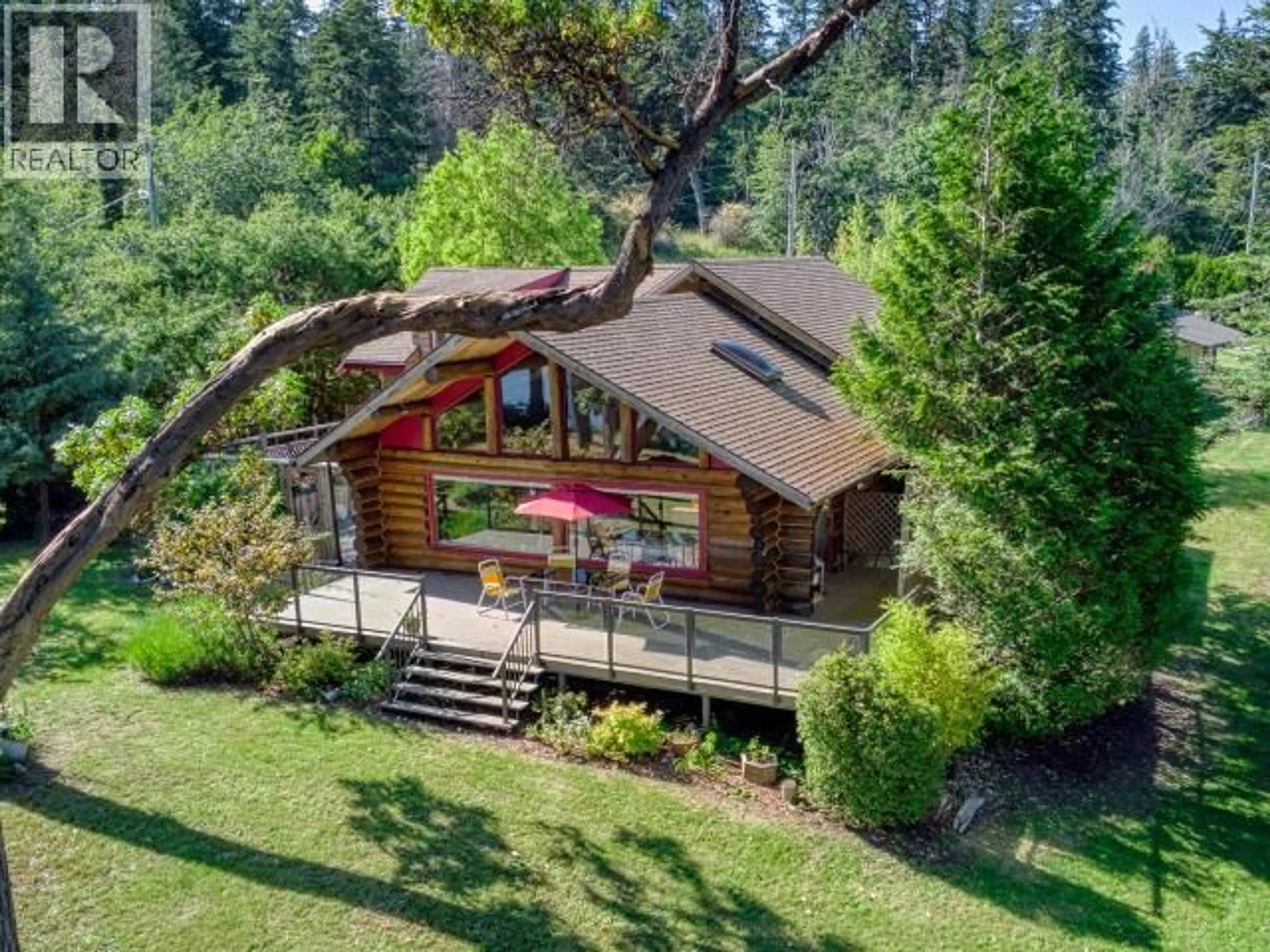 A pic from outside/outdoor area/front of a property/back of a property/a pic from drone, forest/trees view for 4304 SANDERSON ROAD, Texada Island British Columbia V0N1W0