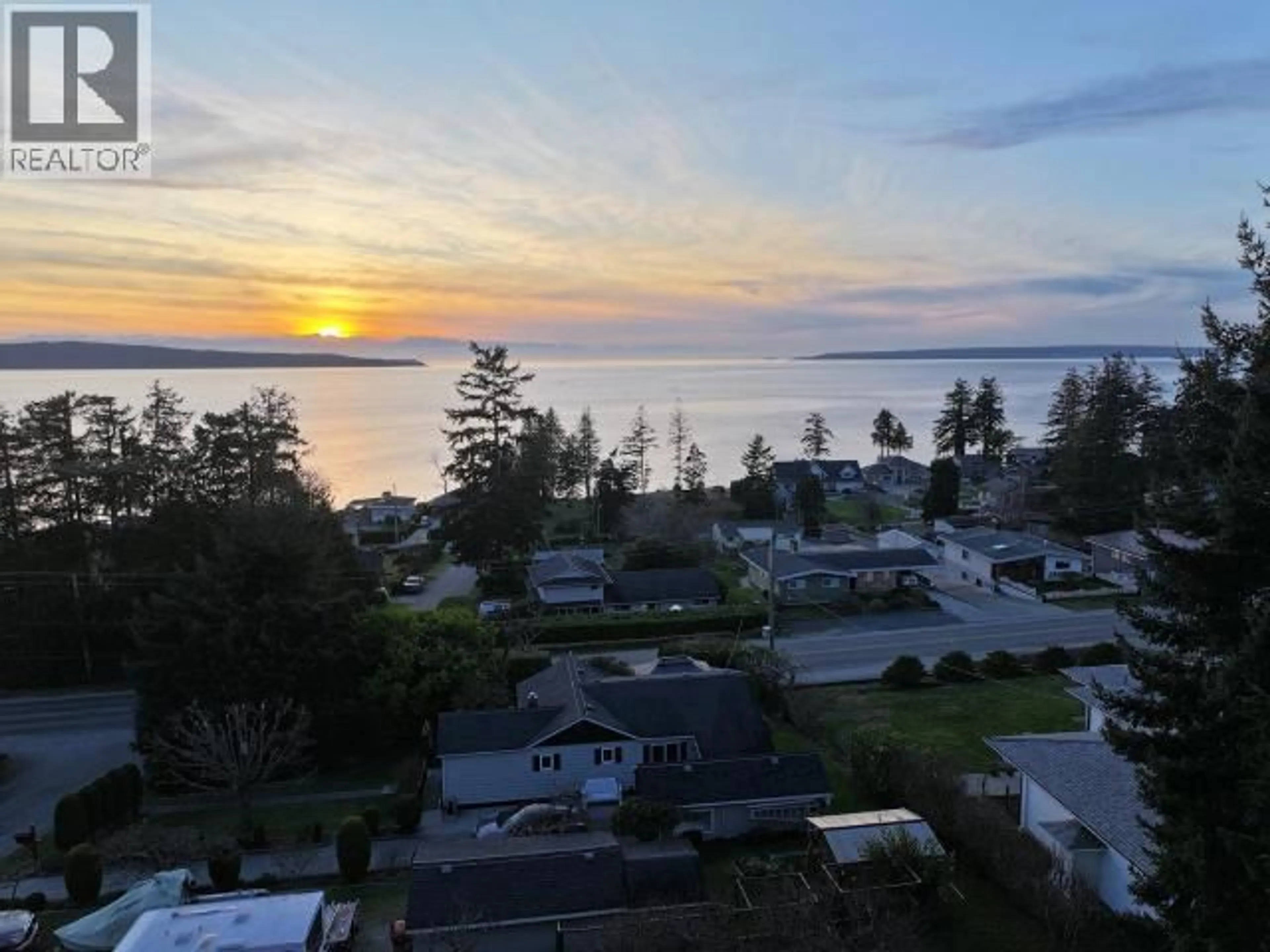 A pic from outside/outdoor area/front of a property/back of a property/a pic from drone, water/lake/river/ocean view for 6955 TERRACE STREET, Powell River British Columbia V8A1H3