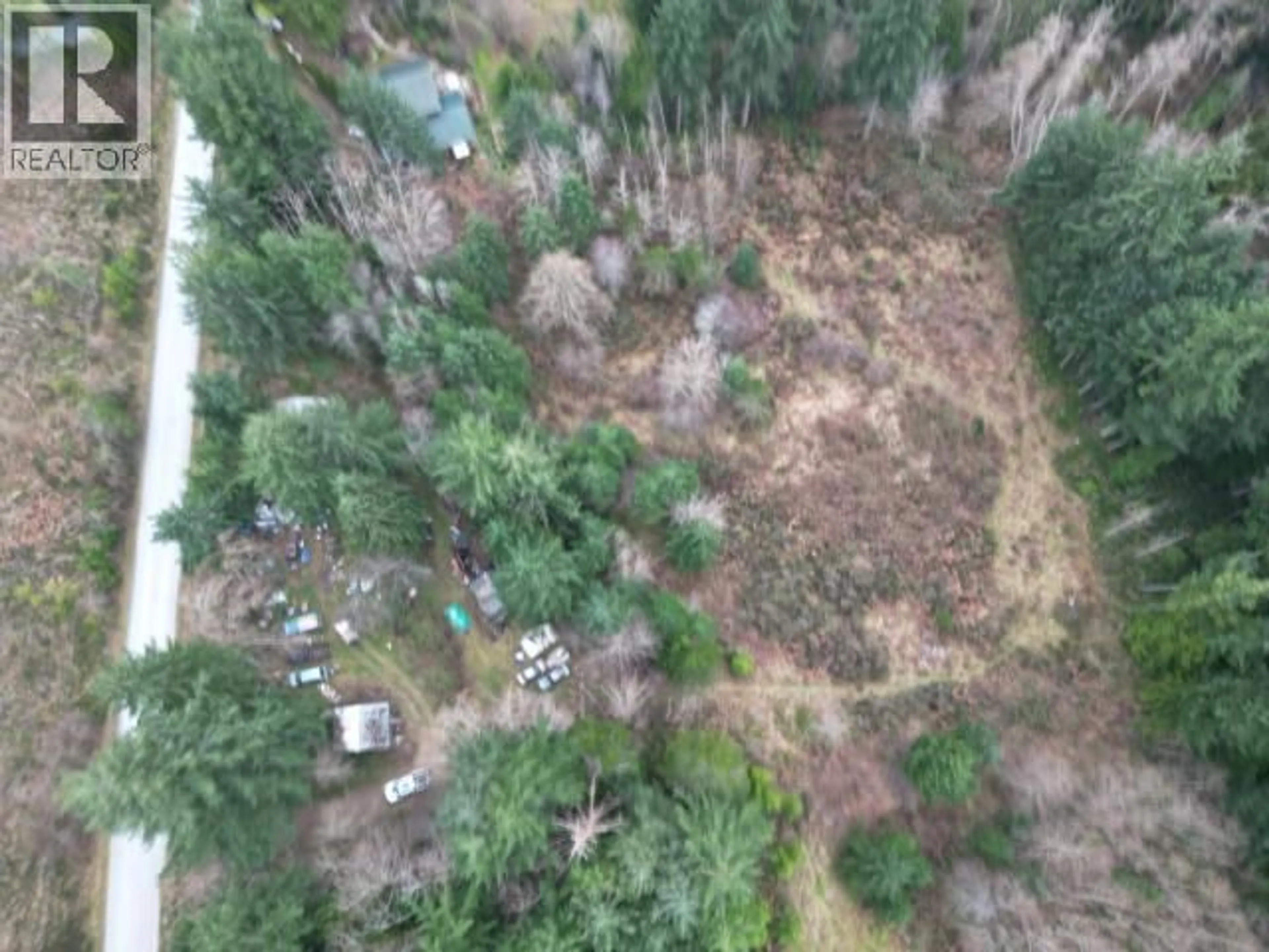 A pic from outside/outdoor area/front of a property/back of a property/a pic from drone, forest/trees view for 11001 DIANNA ROAD, Powell River British Columbia V8A0L7