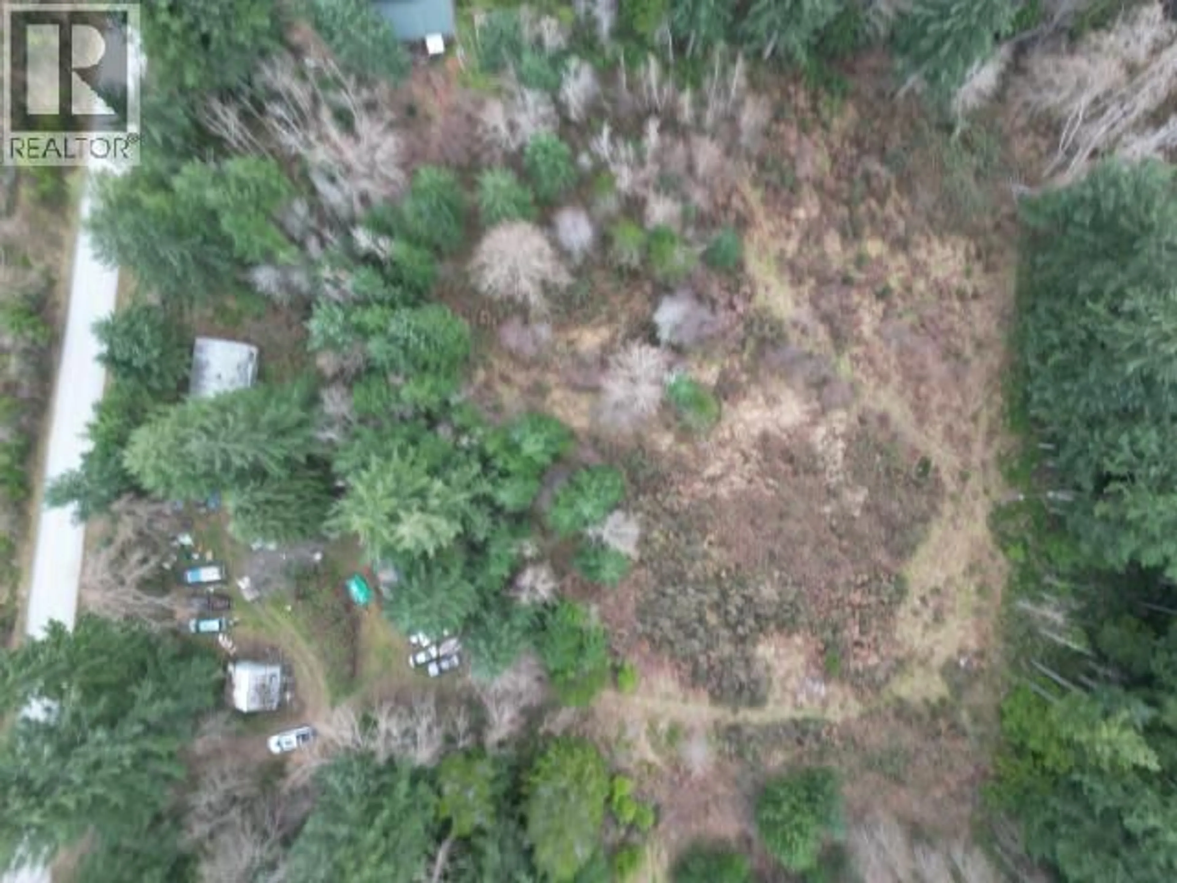 A pic from outside/outdoor area/front of a property/back of a property/a pic from drone, forest/trees view for 11001 DIANNA ROAD, Powell River British Columbia V8A0L7