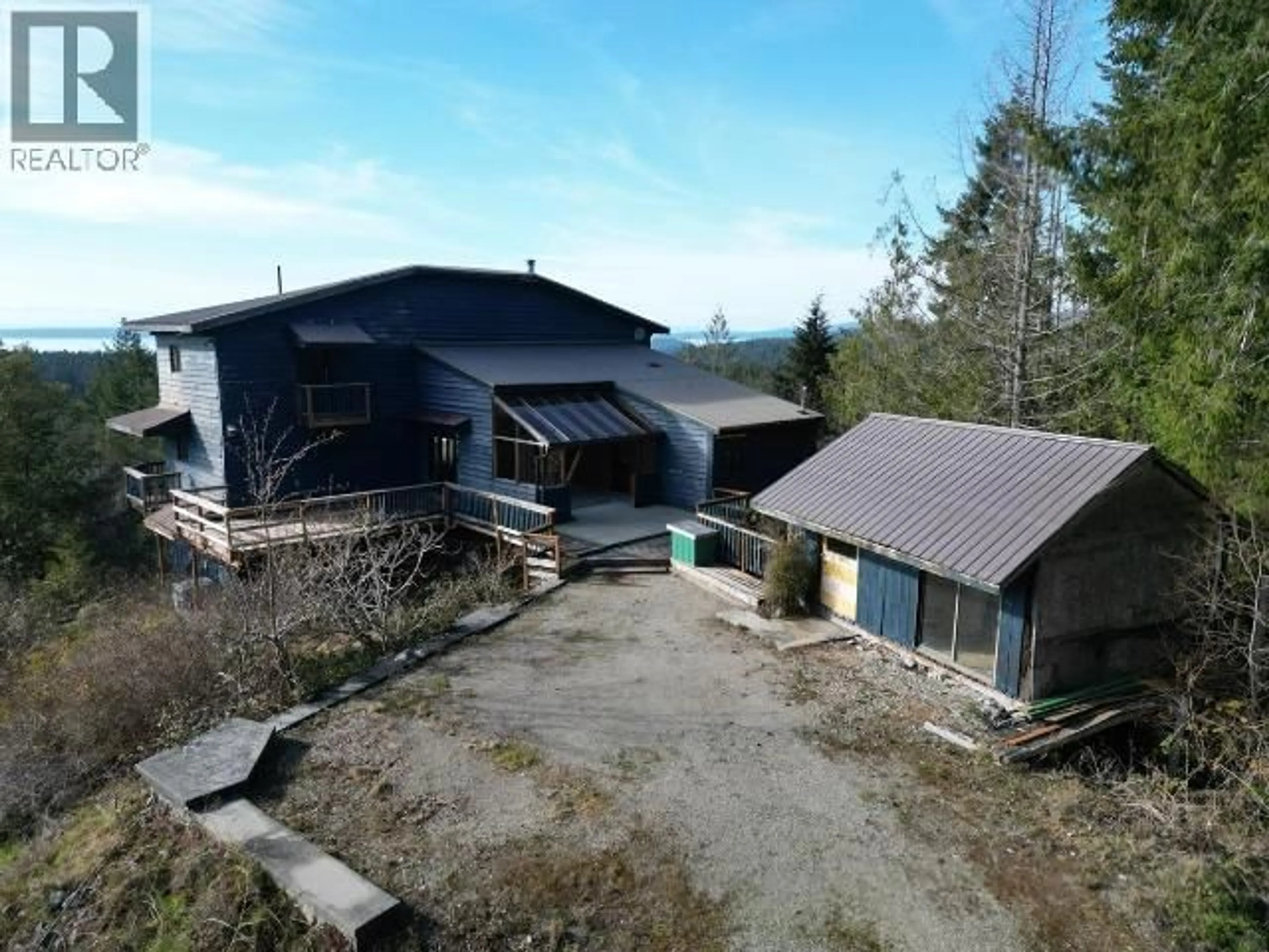 A pic from outside/outdoor area/front of a property/back of a property/a pic from drone, mountain view for 2005 RALPH ROAD, Powell River British Columbia