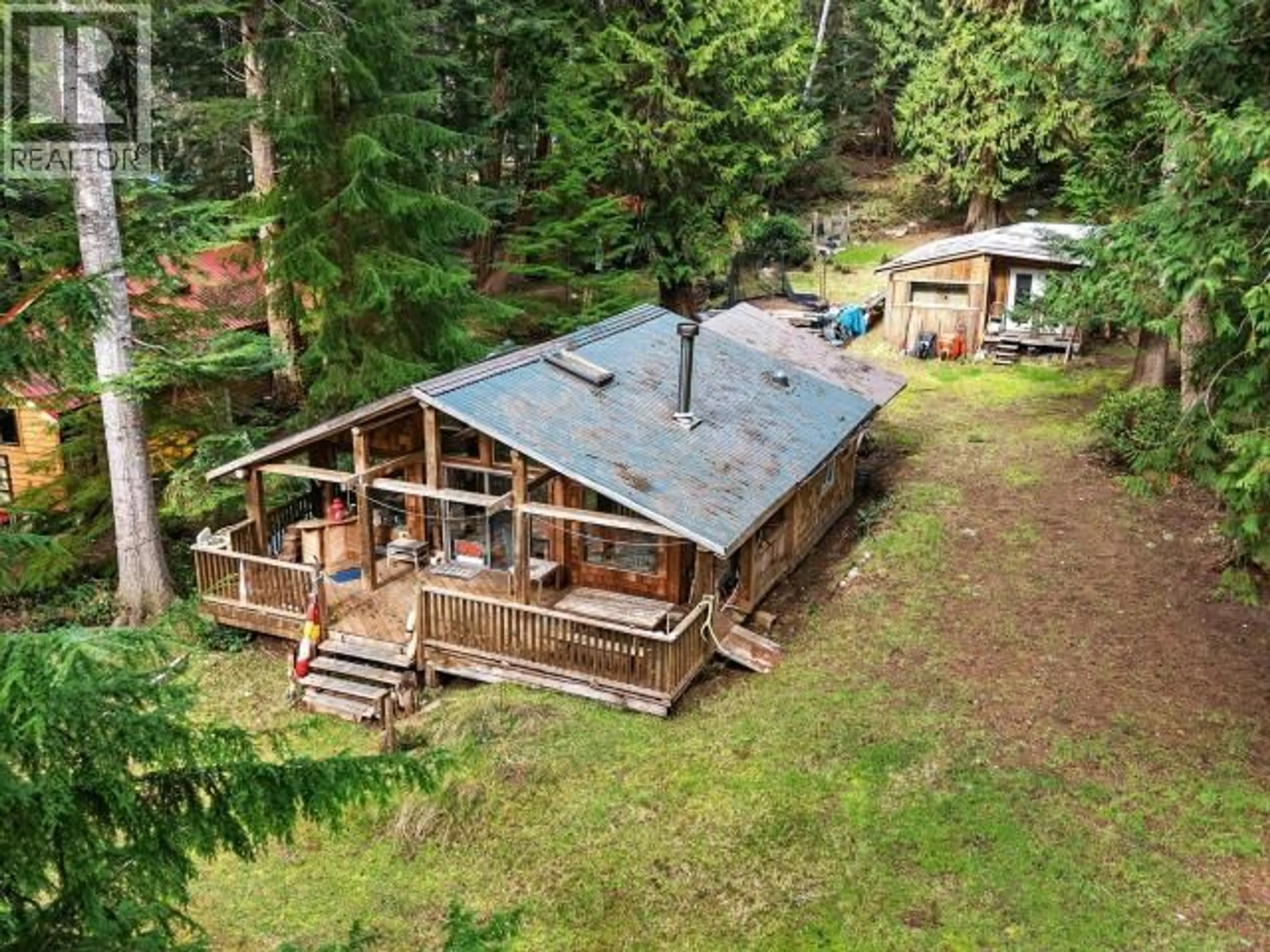 A pic from outside/outdoor area/front of a property/back of a property/a pic from drone, forest/trees view for 1229 TENNYSON RD, Savary Island British Columbia V0N2G0