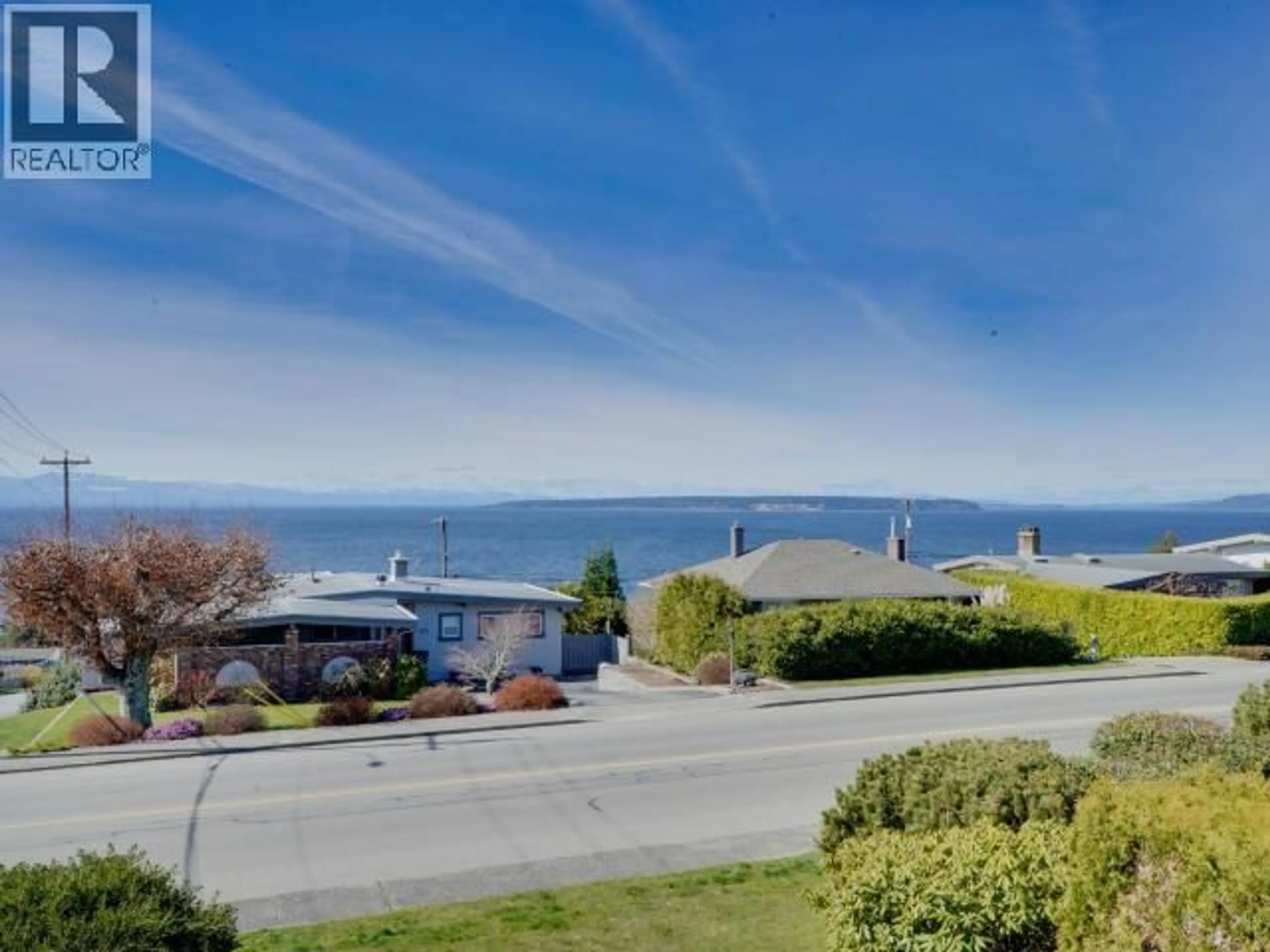 A pic from outside/outdoor area/front of a property/back of a property/a pic from drone, water/lake/river/ocean view for 8 - 3818 JOYCE AVE, Powell River British Columbia V8A2Z1