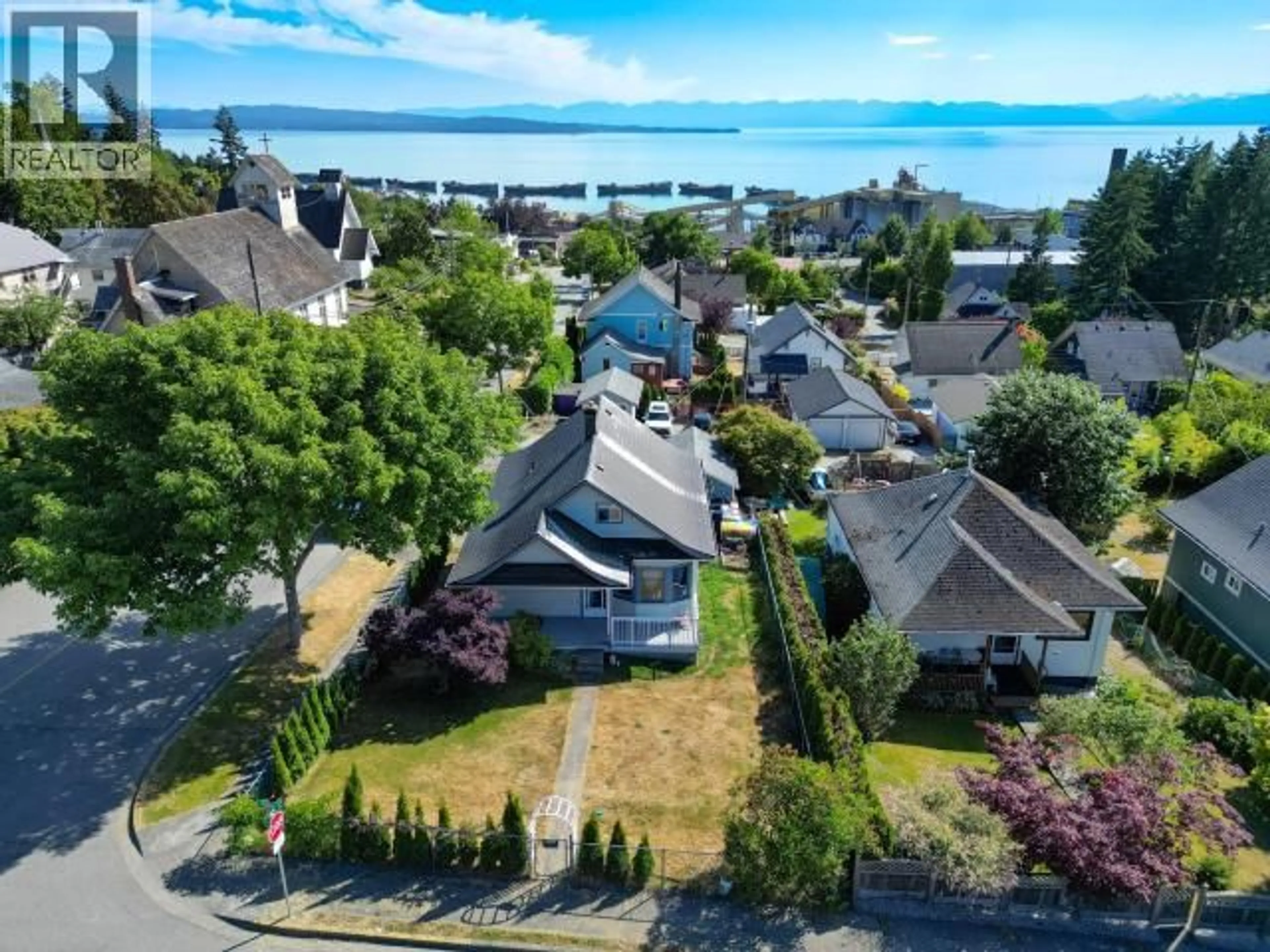 A pic from outside/outdoor area/front of a property/back of a property/a pic from drone, water/lake/river/ocean view for 6304 POPLAR STREET, Powell River British Columbia V8A4L4