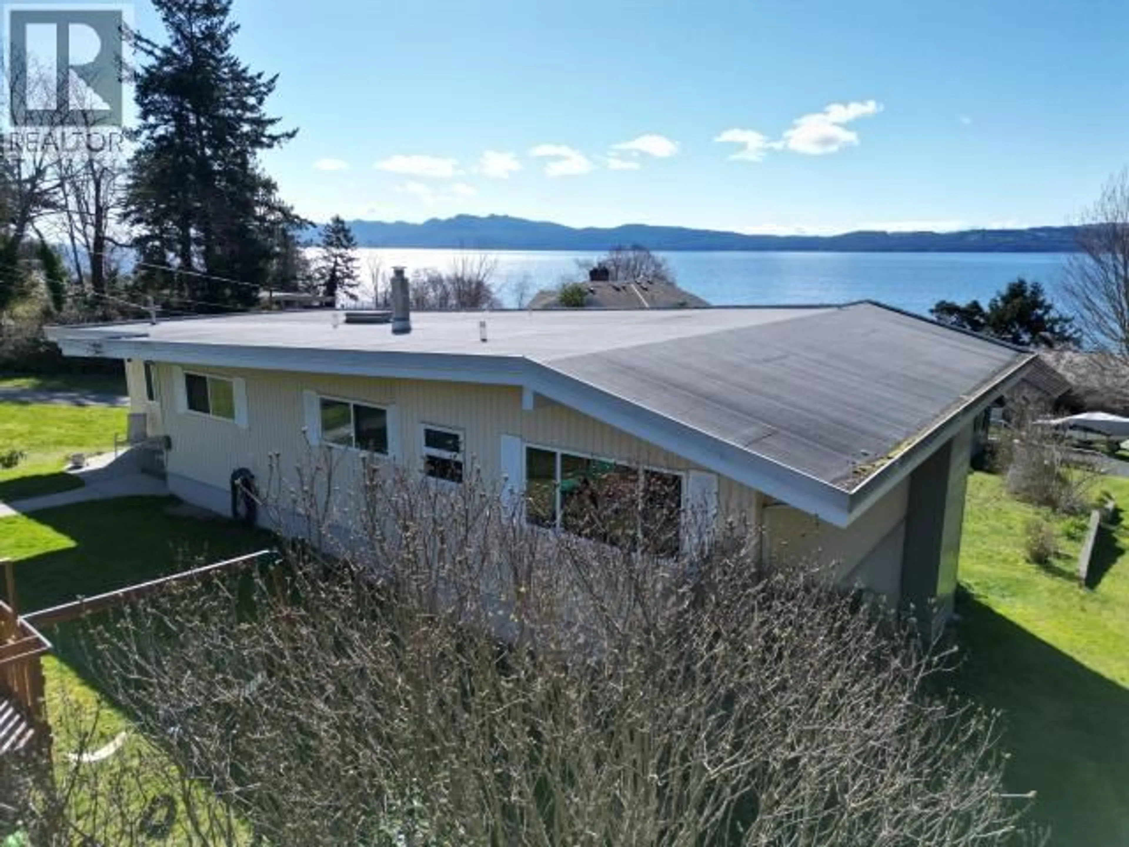 A pic from outside/outdoor area/front of a property/back of a property/a pic from drone, water/lake/river/ocean view for 7110 WESTMINSTER STREET, Powell River British Columbia V8A1C6