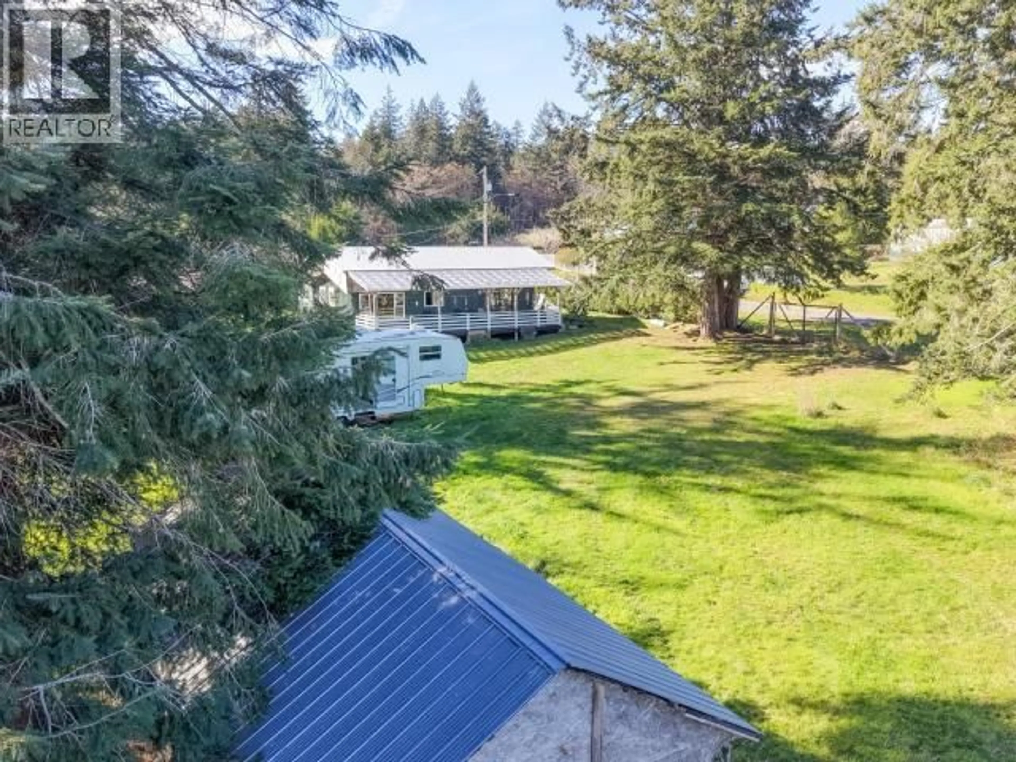 A pic from outside/outdoor area/front of a property/back of a property/a pic from drone, mountain view for 3048 OAK STREET, Texada Island British Columbia