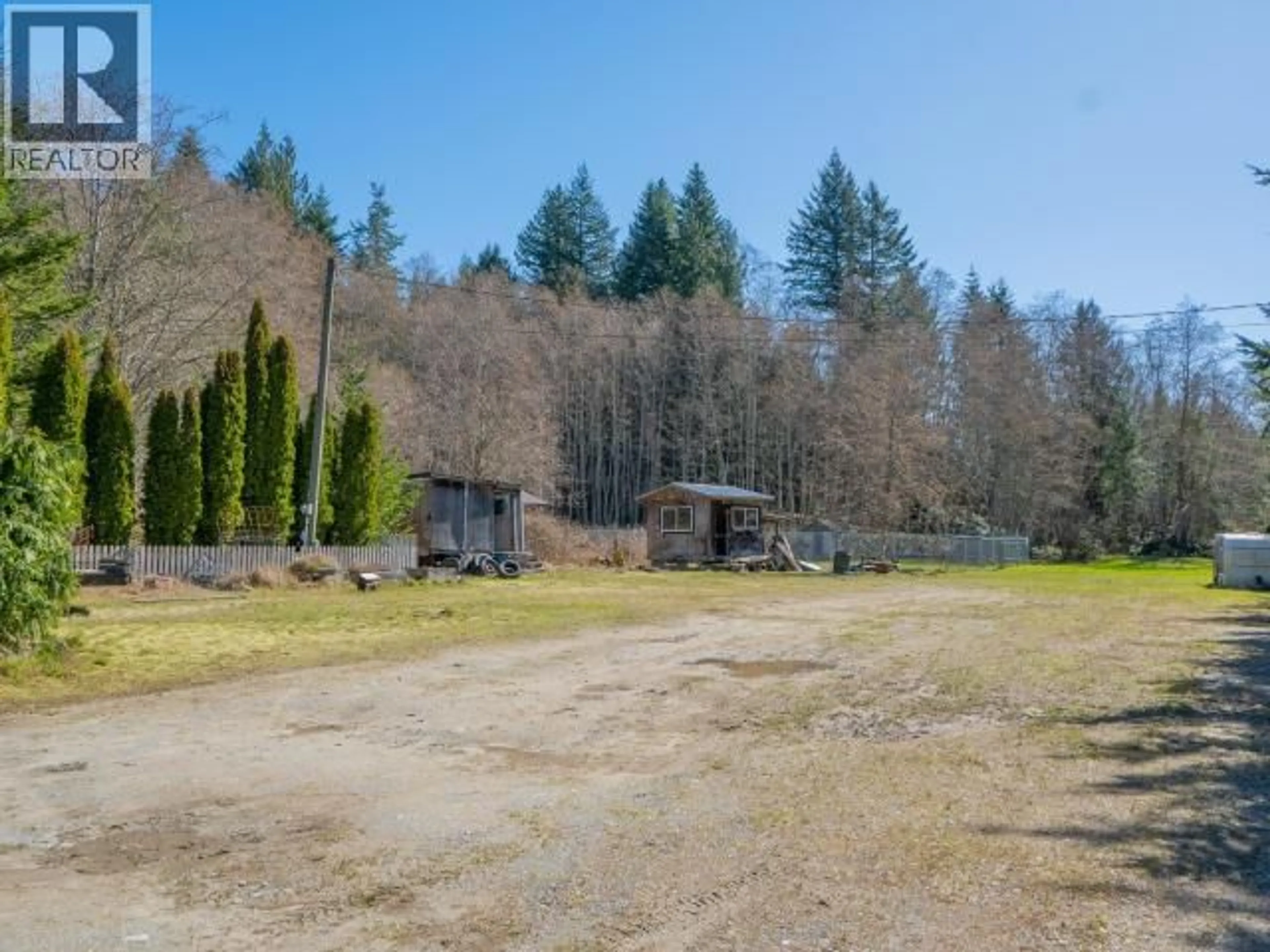 A pic from outside/outdoor area/front of a property/back of a property/a pic from drone, forest/trees view for 4042 PADGETT RD, Powell River British Columbia V8A0S9