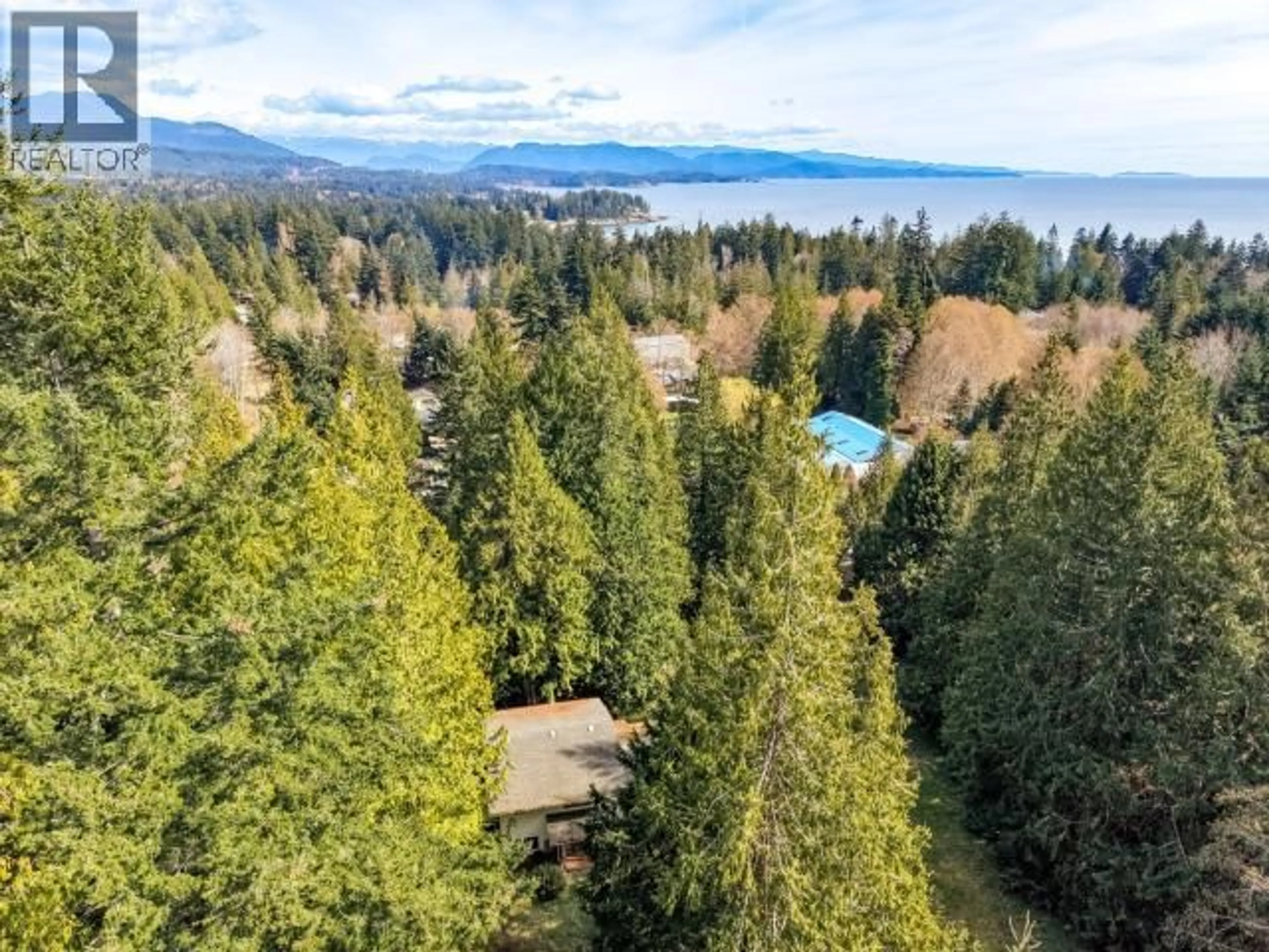 A pic from outside/outdoor area/front of a property/back of a property/a pic from drone, water/lake/river/ocean view for 2217 BLACK POINT ROAD, Powell River British Columbia