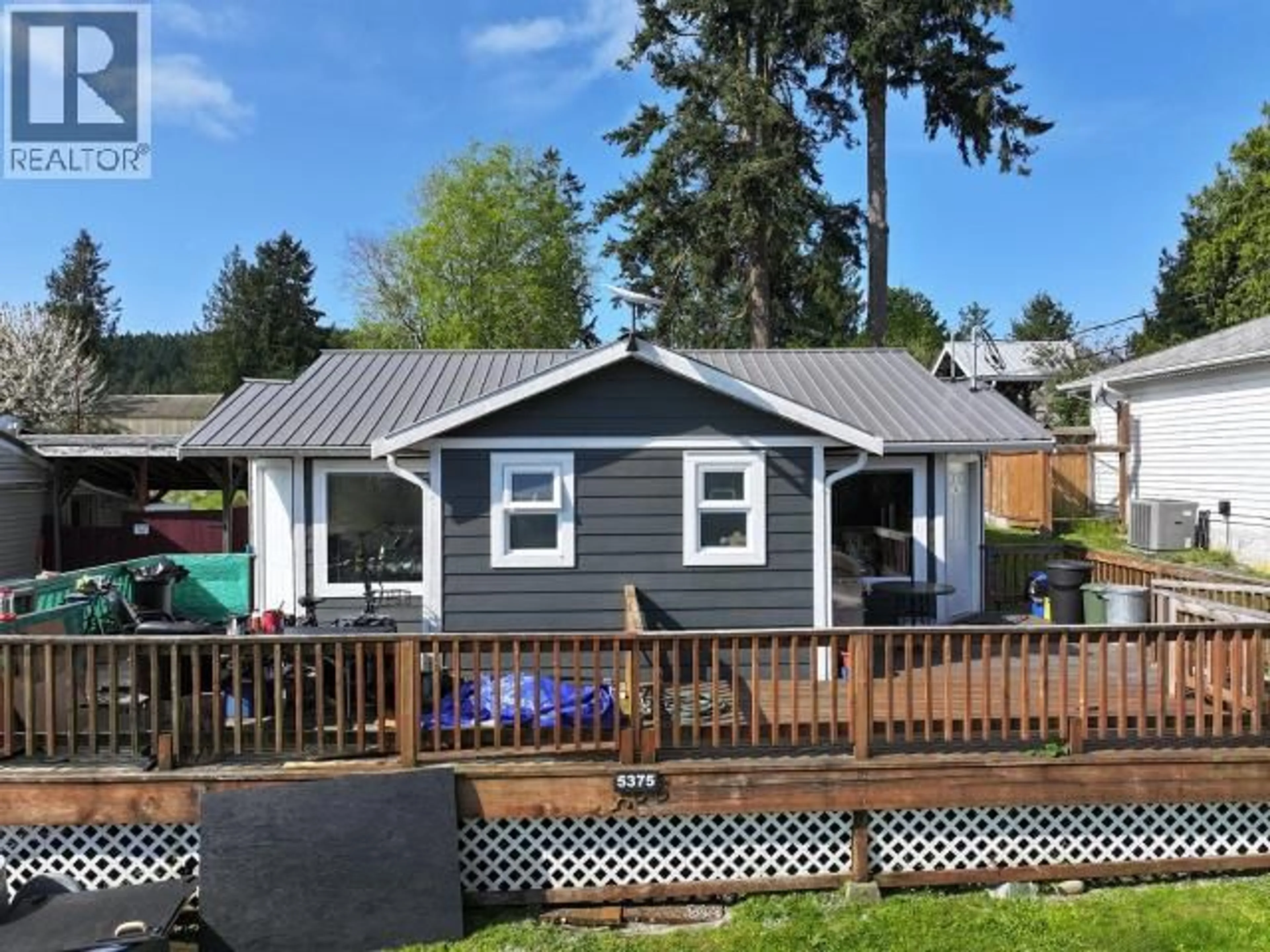 Home with vinyl exterior material, street for 5375 EARL STREET, Texada Island British Columbia