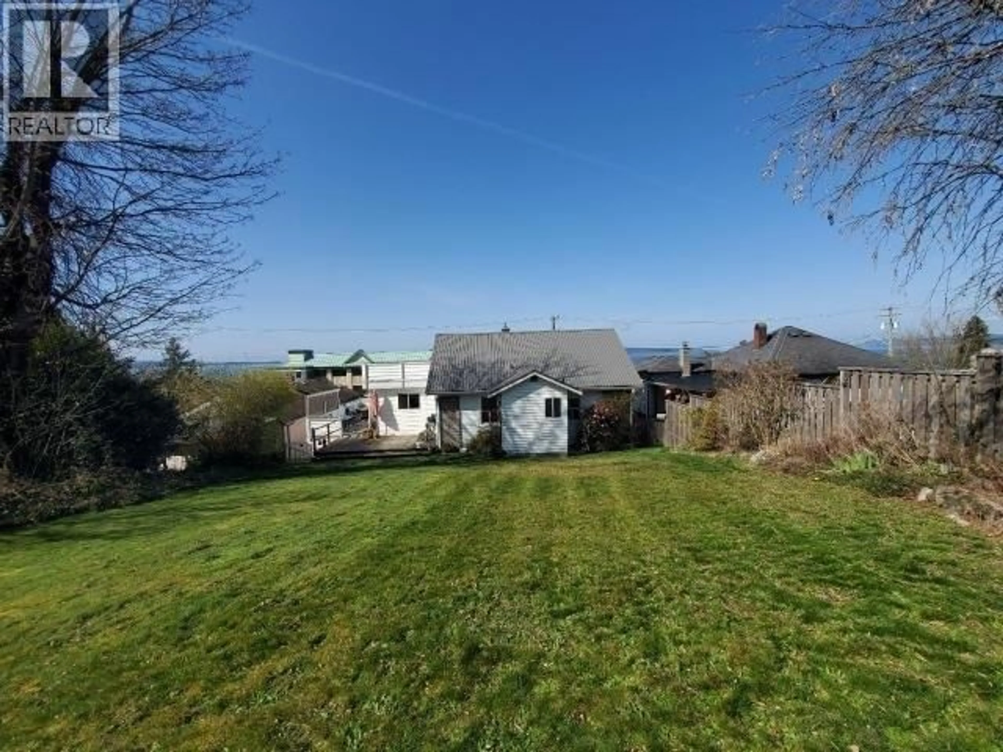 A pic from outside/outdoor area/front of a property/back of a property/a pic from drone, mountain view for 4516 MARINE AVE, Powell River British Columbia