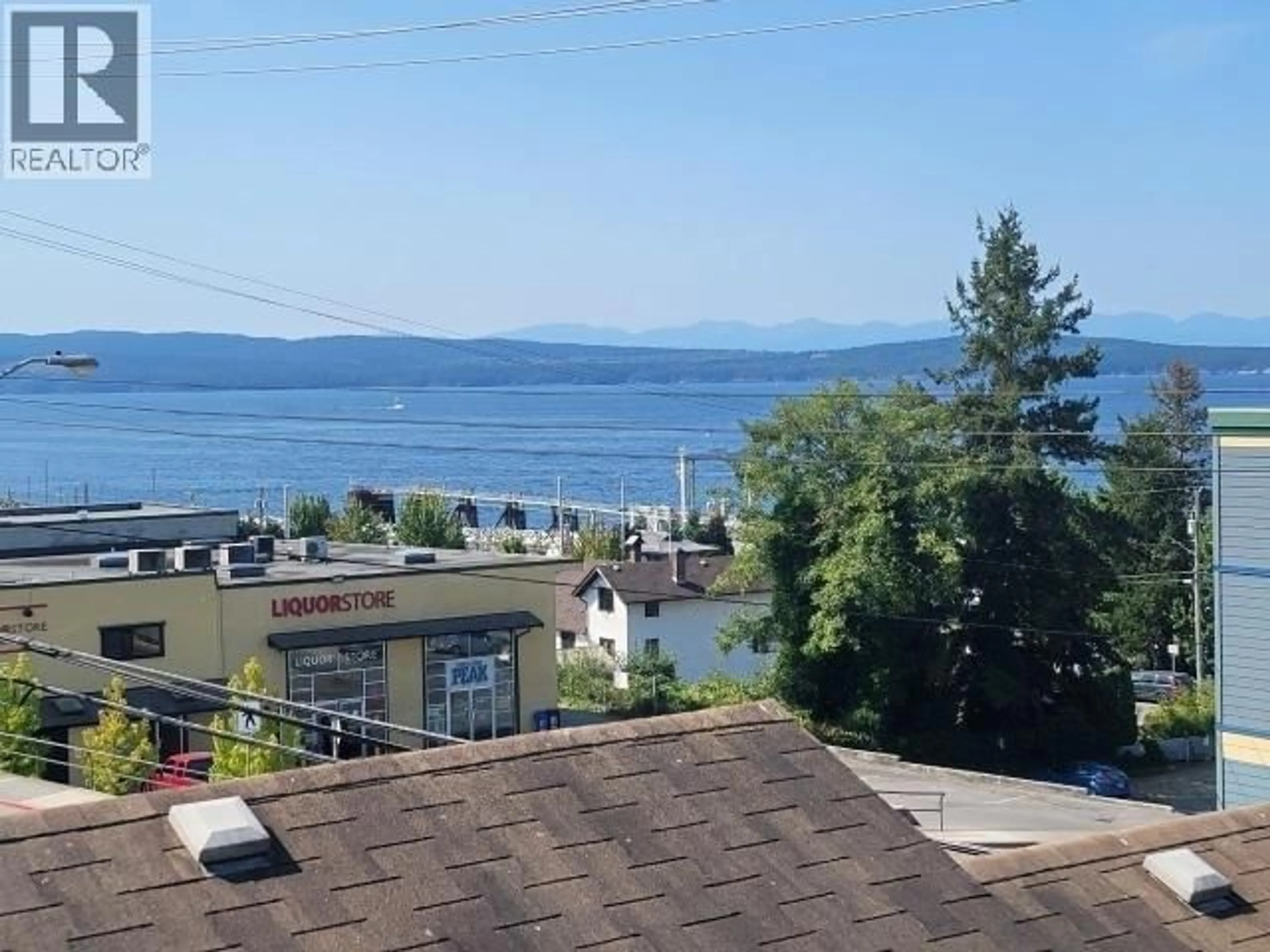 A pic from outside/outdoor area/front of a property/back of a property/a pic from drone, water/lake/river/ocean view for 4516 MARINE AVE, Powell River British Columbia