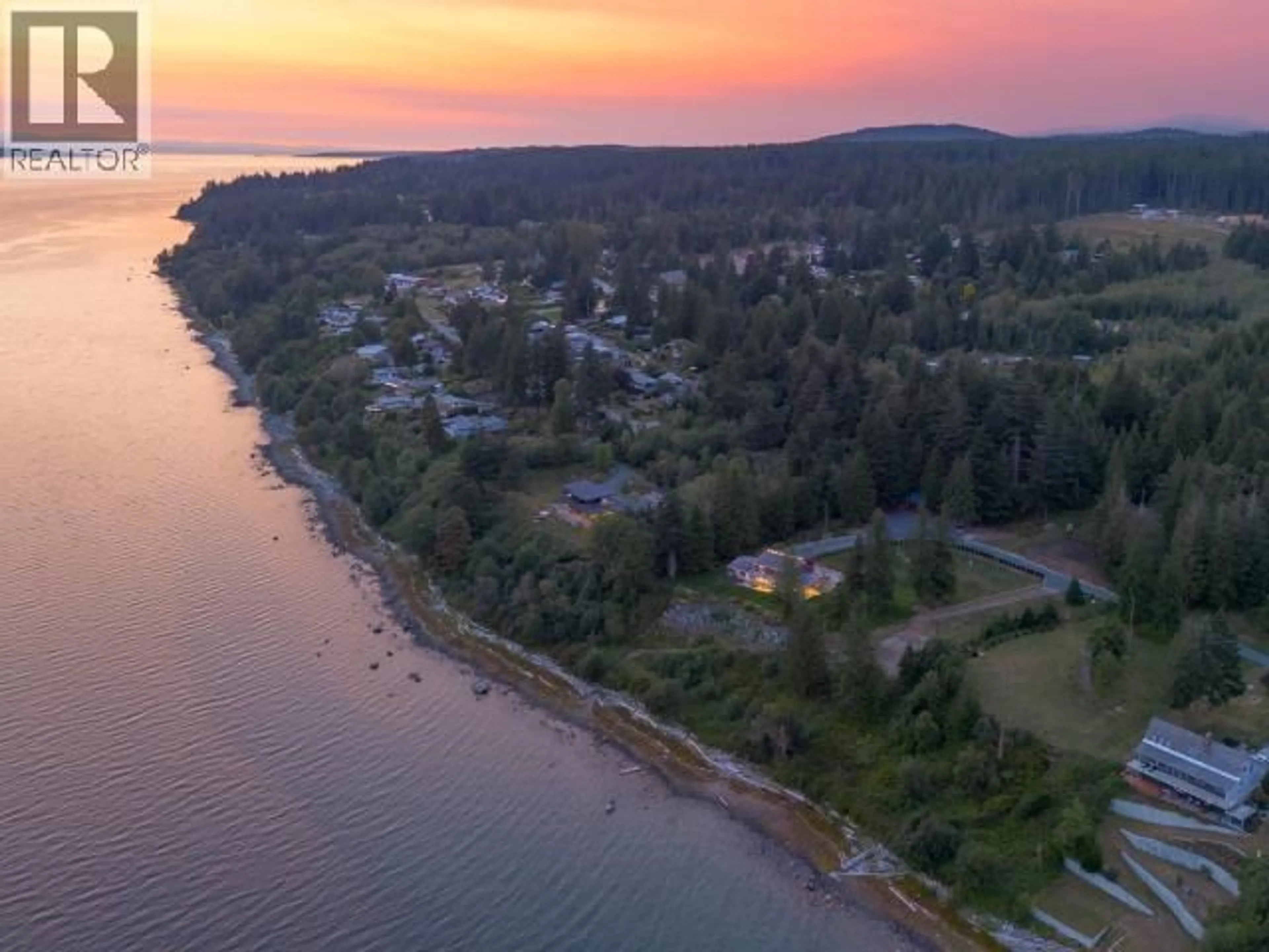 A pic from outside/outdoor area/front of a property/back of a property/a pic from drone, water/lake/river/ocean view for 9771 VIEW ROAD, Powell River British Columbia V8A0J8